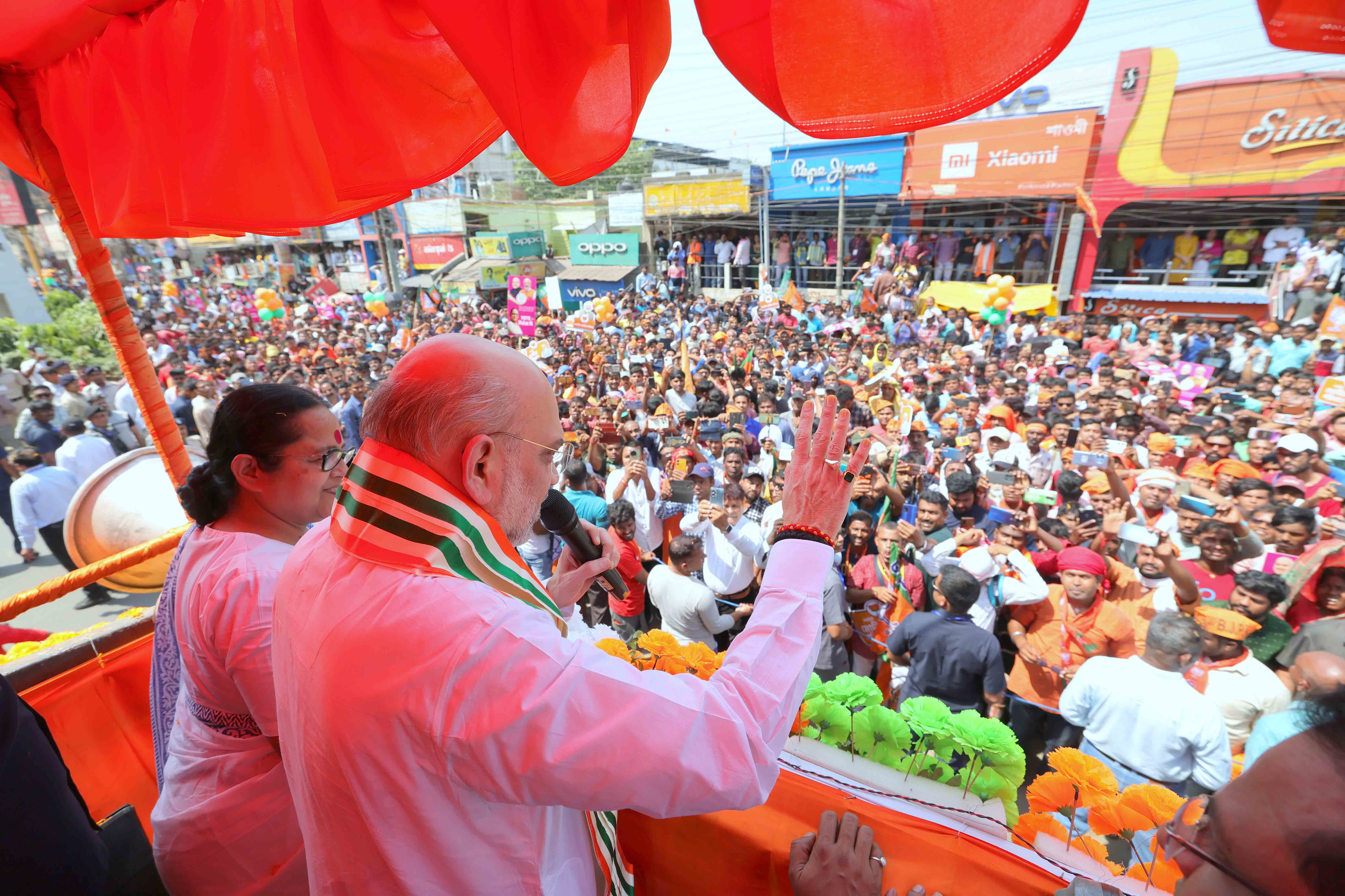  Hon'ble Union Home Minister & Minister of Cooperation Shri Amit Shah while addressing a road show in Malda South and public rally in Raiganj (West Bengal)