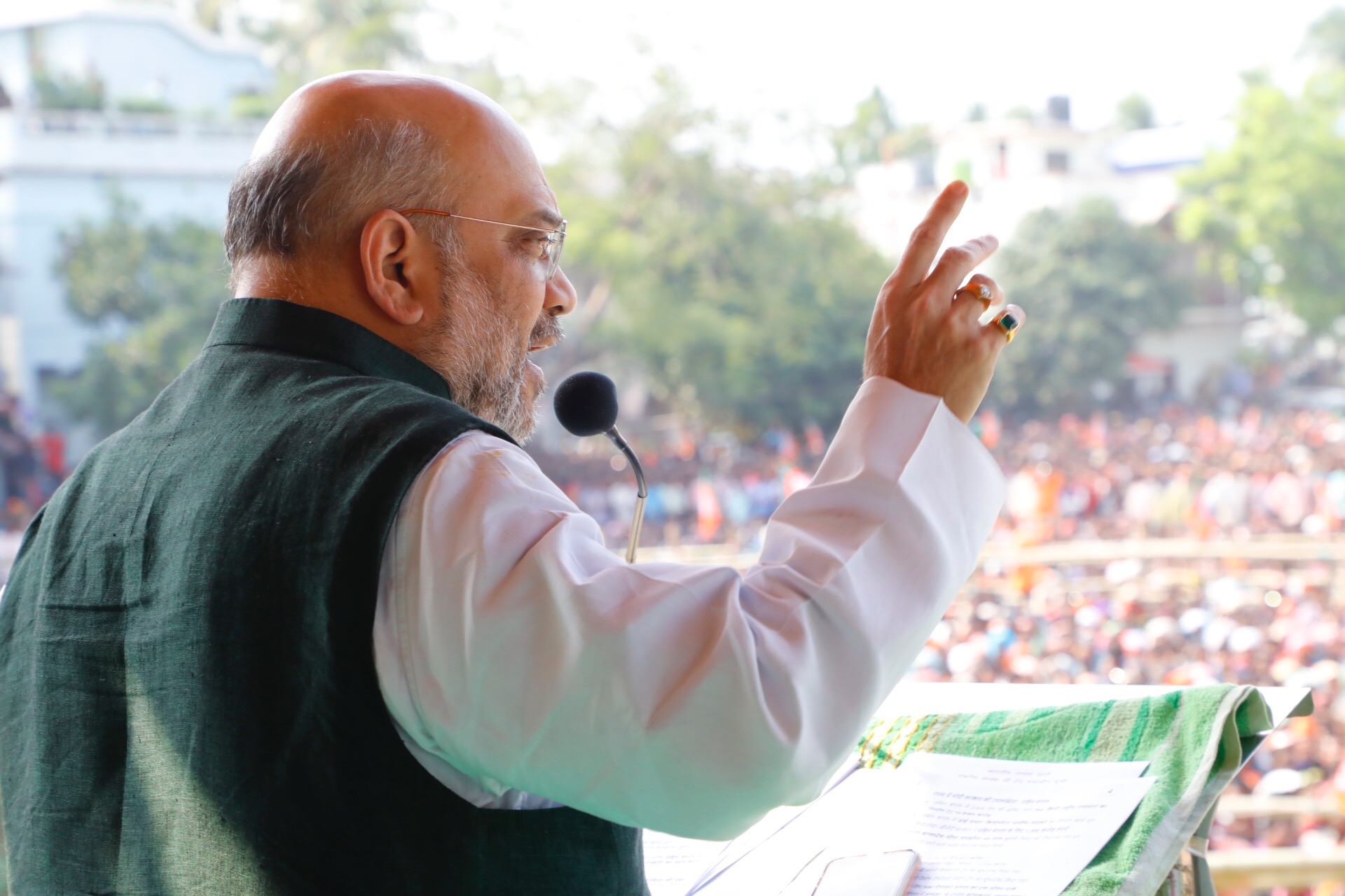 Photographs of BJP National President, Shri Amit Shah addressing a public meeting in Raiganj (Uttar Dinajpur)