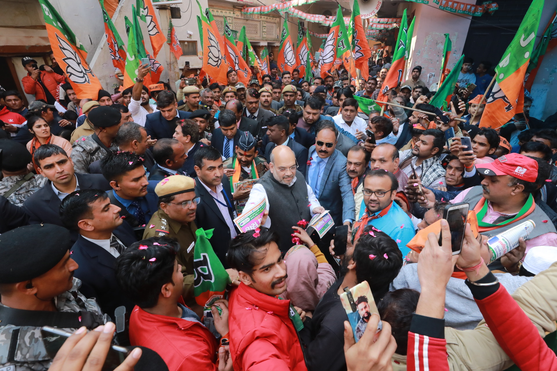 Photographs of Hon'ble Home Minister Shri Amit Shah door to door campaign under "MahaJan Sampark Abhiyan" in Old Mehram Nagar, Delhi Cantt.(Delhi)