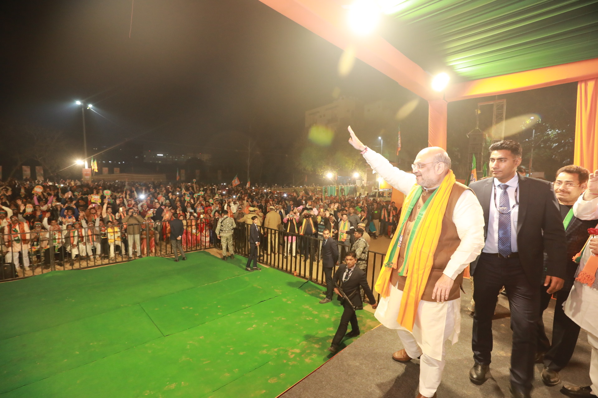 Photographs of Hon'ble Home Minister Shri Amit Shah addressing public meeting at Nehru Nagar, Ram Lila Ground, Patel Nagar Vidhansabha (Delhi)..