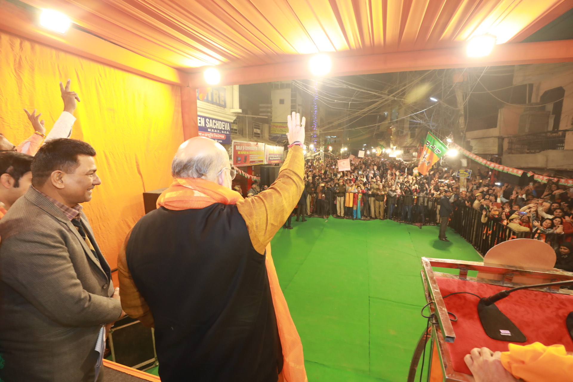 Photographs of Hon'ble Home Minister Shri Amit Shah addressing a public meeting at Bedi Market Near Shah Namkeen, Parwana Road, Krishna Nagar (Delhi).