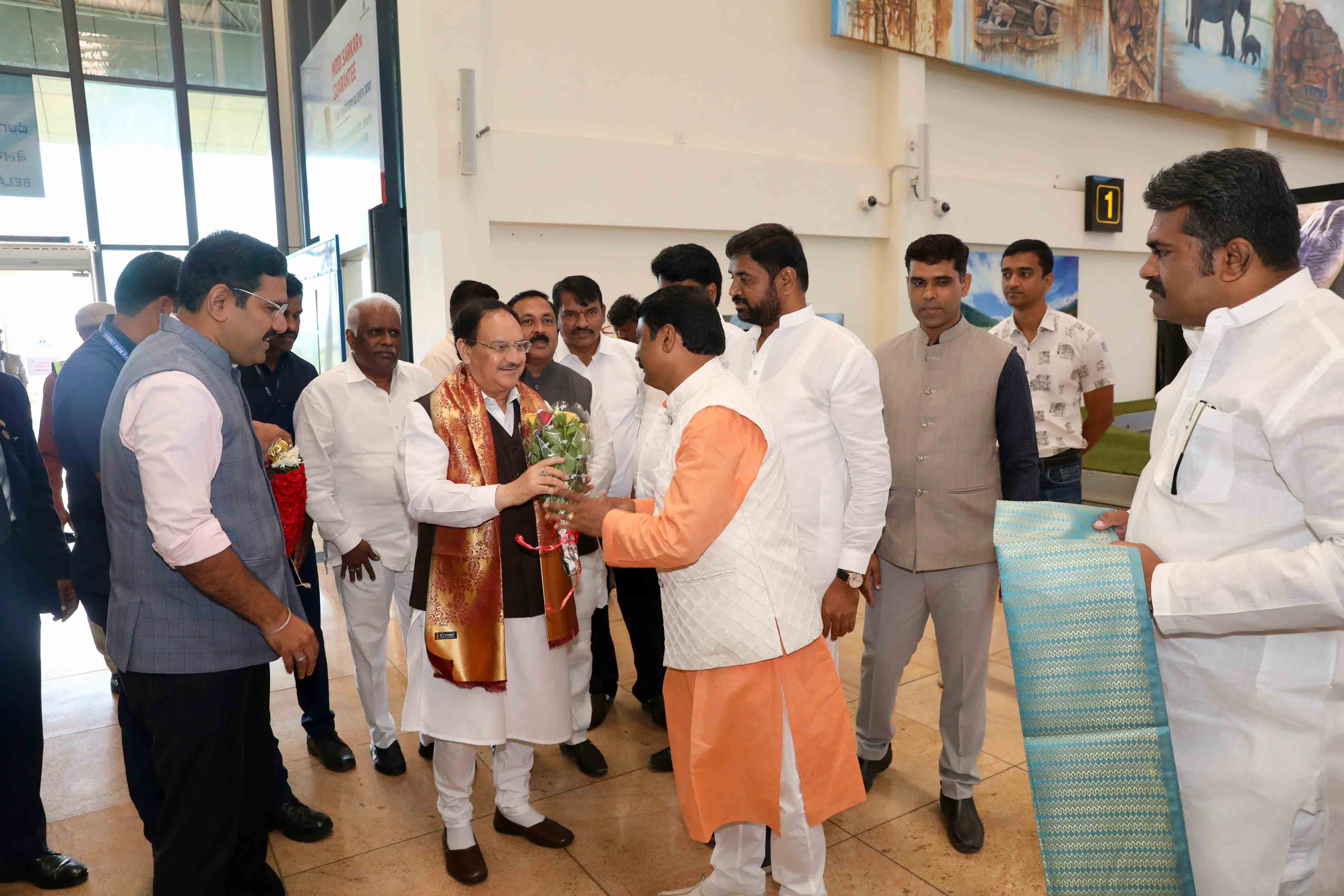 Grand welcome of Hon'ble BJP National President Shri J.P. Nadda on arrival at Belagavi Airport in Karnataka.