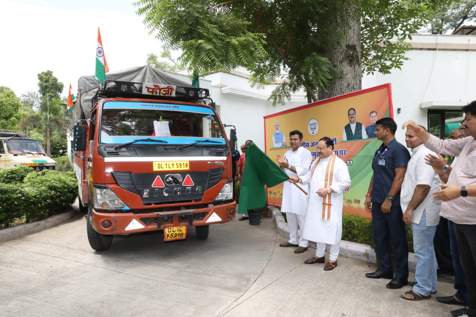 Hon'ble BJP National President Shri J.P. Nadda flagging off containers with 1 lakh tricolors for West Delhi under "Har Ghar Tiranga" campaign on Azadi ka Amrit Mahotsav