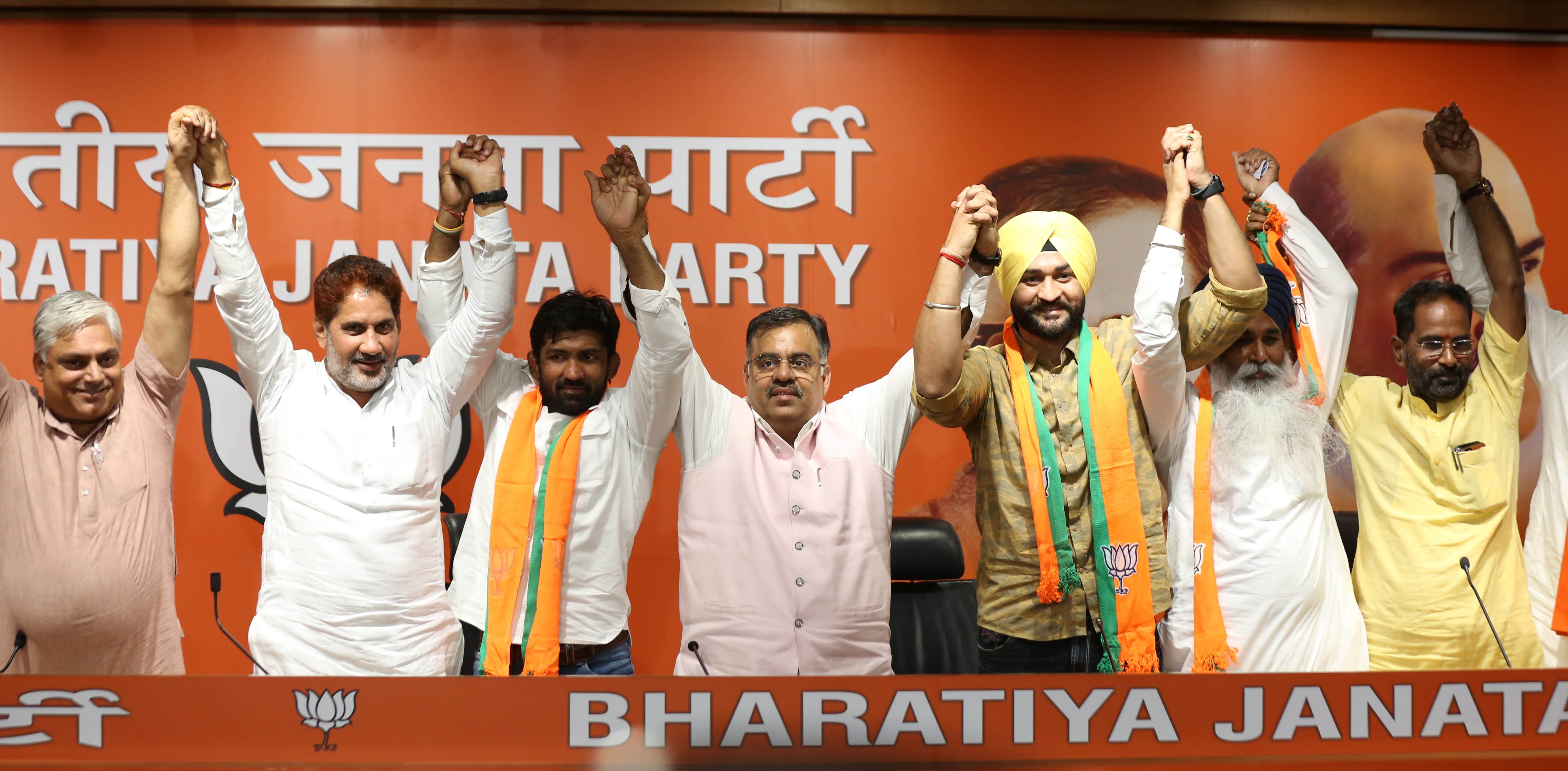  Olympic Medallist in Wrestling Shri Yogeshwar Dutt and former Indian Hockey captain Sandeep Singh joining BJP in presence of Haryana BJP State President Shri Subhash Barala at BJP HQ, 6A DDU Marg, New Delhi