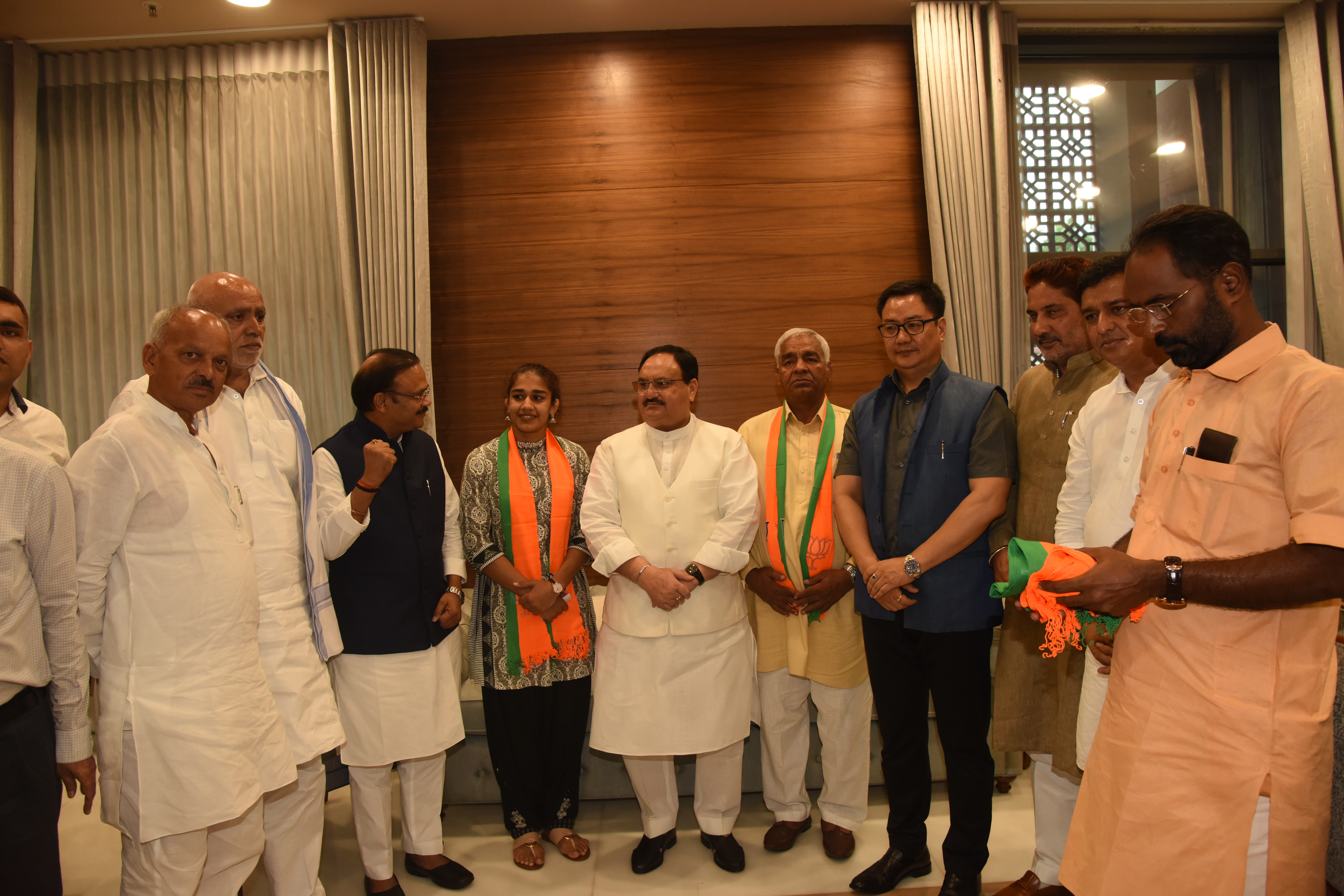 Photograph : Shri Mahaveer Phoghat and star wrestler Babita Phogat joining BJP in presence of BJP Working President, Shri J.P. Nadda at BJP HQ, 6A DDU Marg, New Delhi