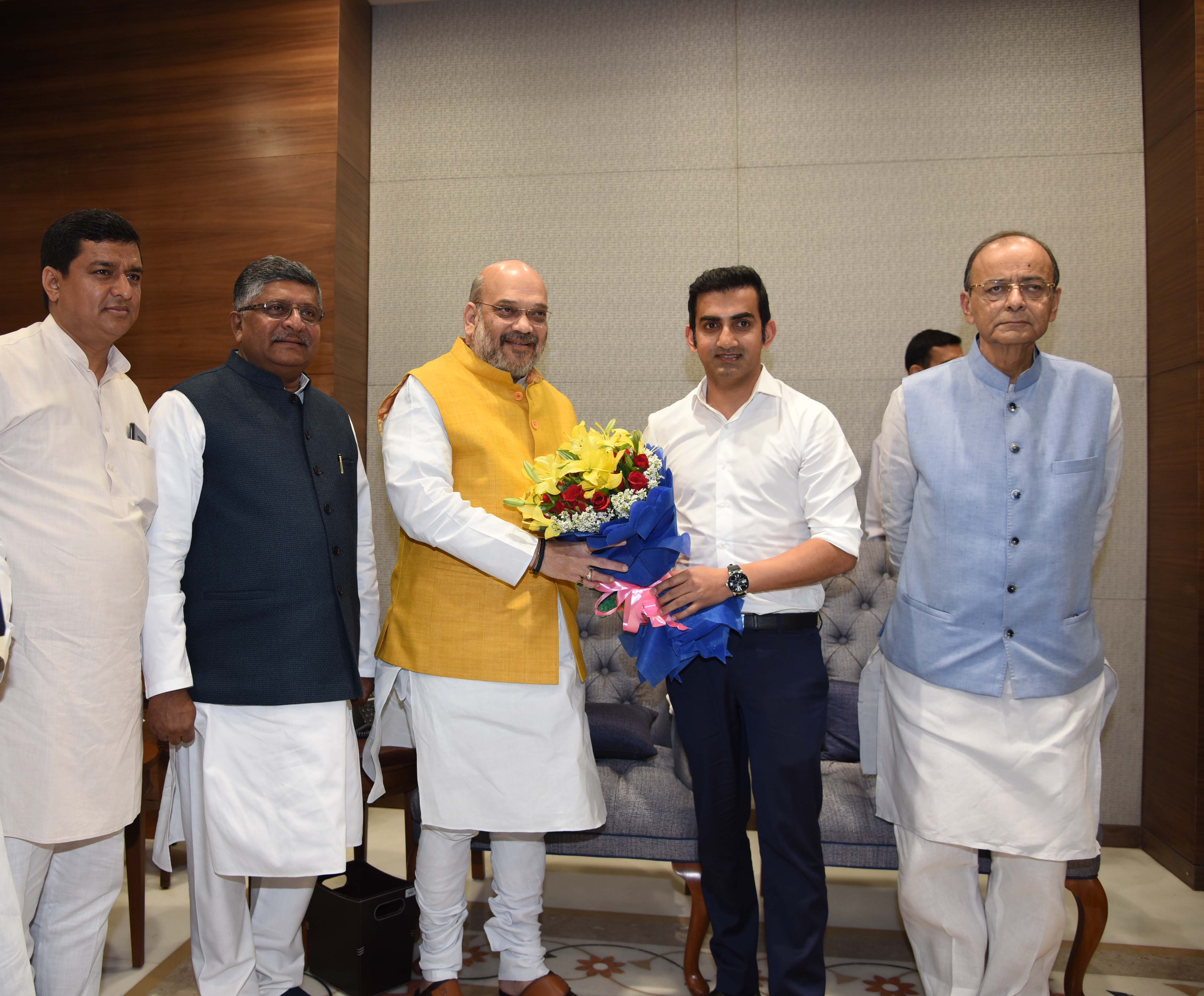 Photographs : Former Indian Cricketer, Shri Gautam Gambhir joining BJP in presence of BJP National President, Shri Amit Shah at BJP HQ, 6A Deendayal Upadhyay Marg, New Delhi