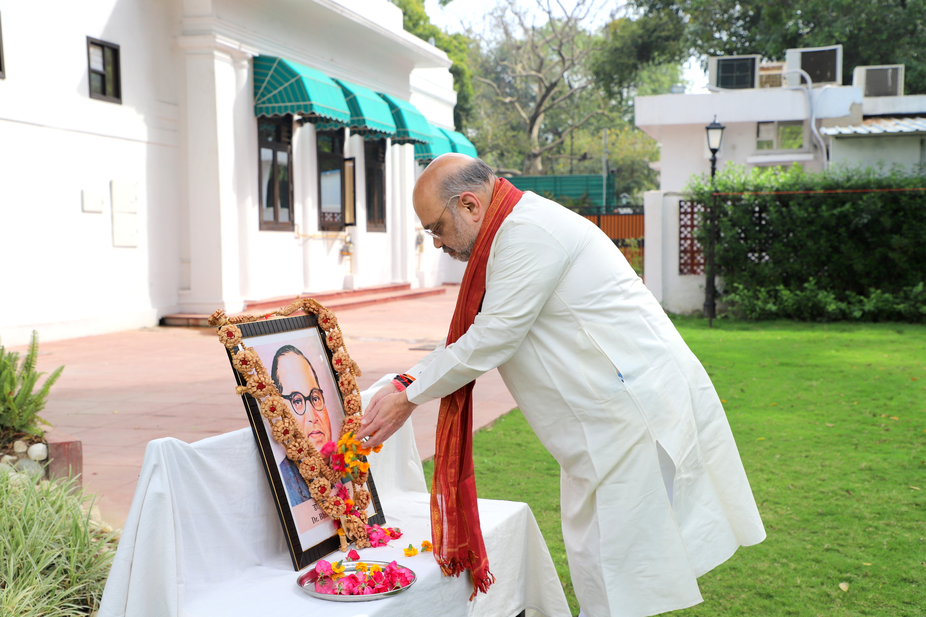 Photographs : Hon'ble Home Minister Shri Amit Shah paid floral tribute to Babasaheb Ambedkar on his Jayanti