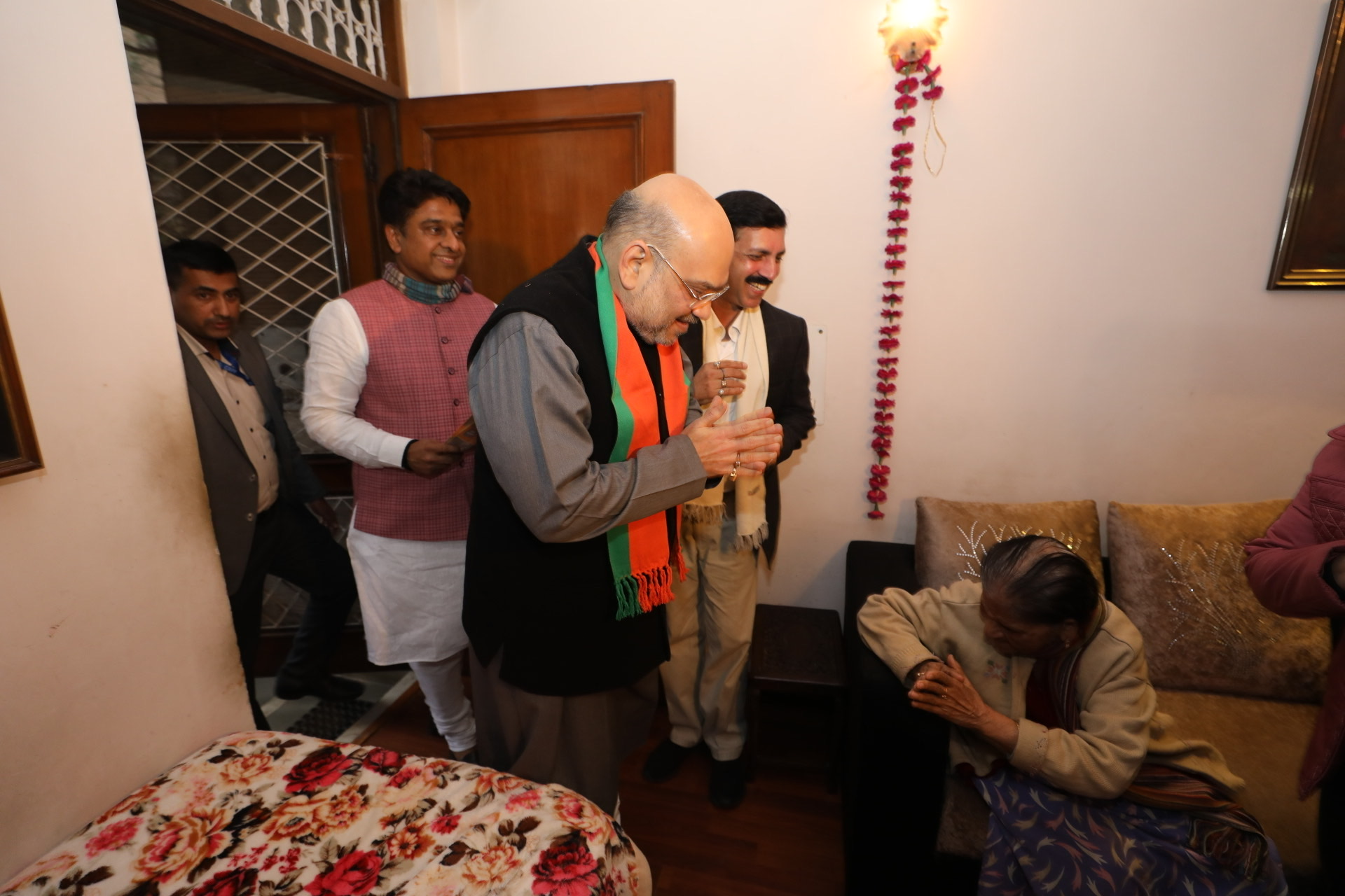 Photographs : BJP National President Shri Amit Shahji's door to door campaign as a part of Jan Jagran Abhiyan to create awarenesson CAA in New Delhi