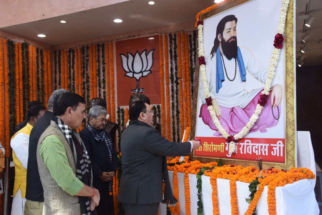 Photographs : BJP National President Shri J.P. Nadda paying floral tribute to Sant Ravidas Ji on his jayanti at BJP HQ, 6A, DDU Marg, New Delhi