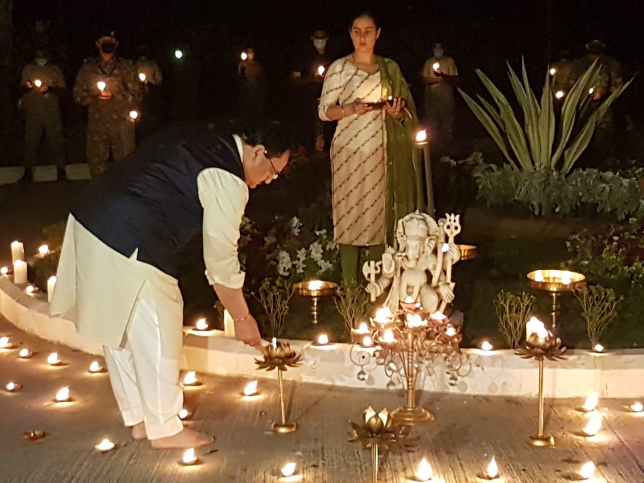 Photographs : BJP National President Shri J.P. Nadda lighting Diyas at 9 PM for 9 Minutes for unity against COVID19 at his residence, New Delhi on 05.04.2020