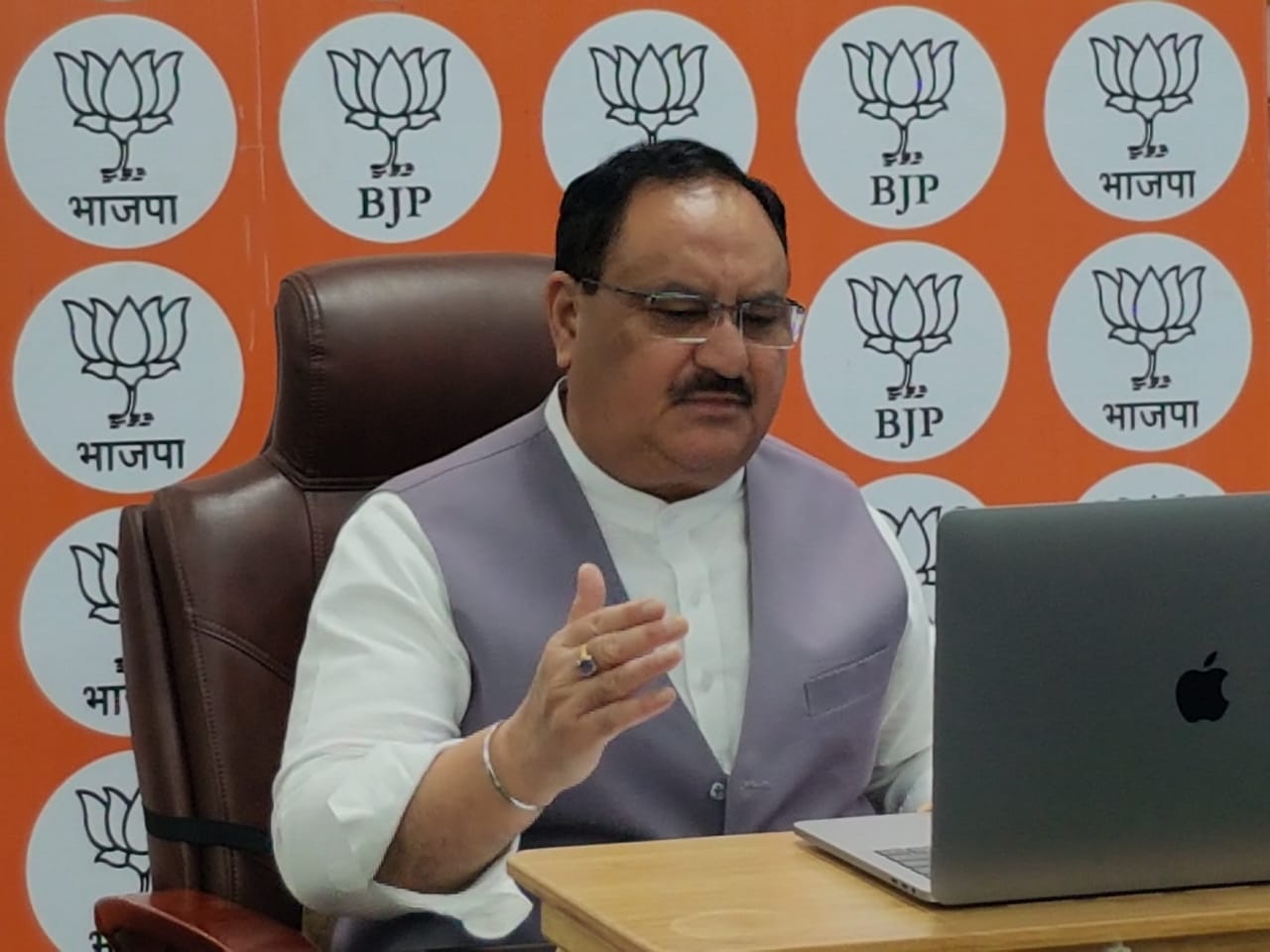 Photographs of BJP National President Shri J.P. Nadda interacting with Ayush and Ayurveda related professionals, practitioners & Policy makers via video conferencing