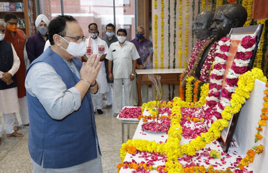 Photograps : BJP National President Shri J.P. Nadda paying floral tribute to Shri Kushabhau Thakre at BJP HQ, 6A DDU Marg, New Delhi.