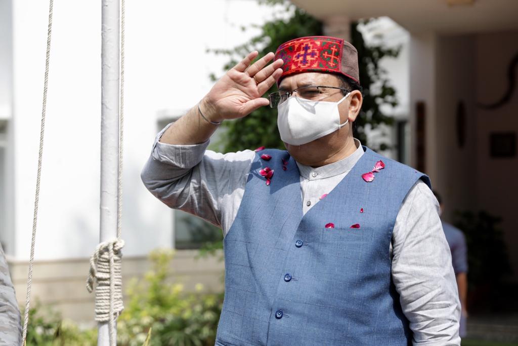 Photograps : BJP National President Shri J.P. Nadda hoisting the National Flag at his residence 7-B, Motilal Nehru Marg, New Delhi