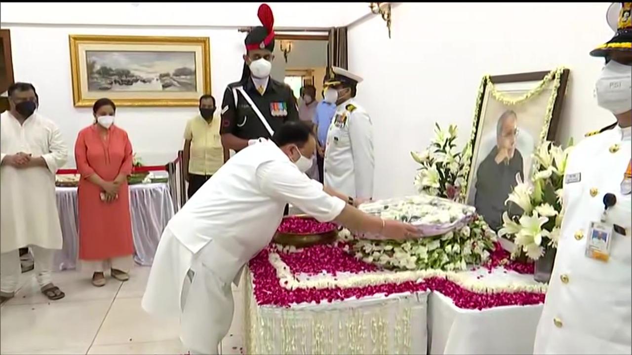 Photograps : BJP National President Shri J.P. Nadda paying floral tribute to Former President of India Shri Pranab Mukherjee at his residence 10, Rajaji Marg, New Delhi