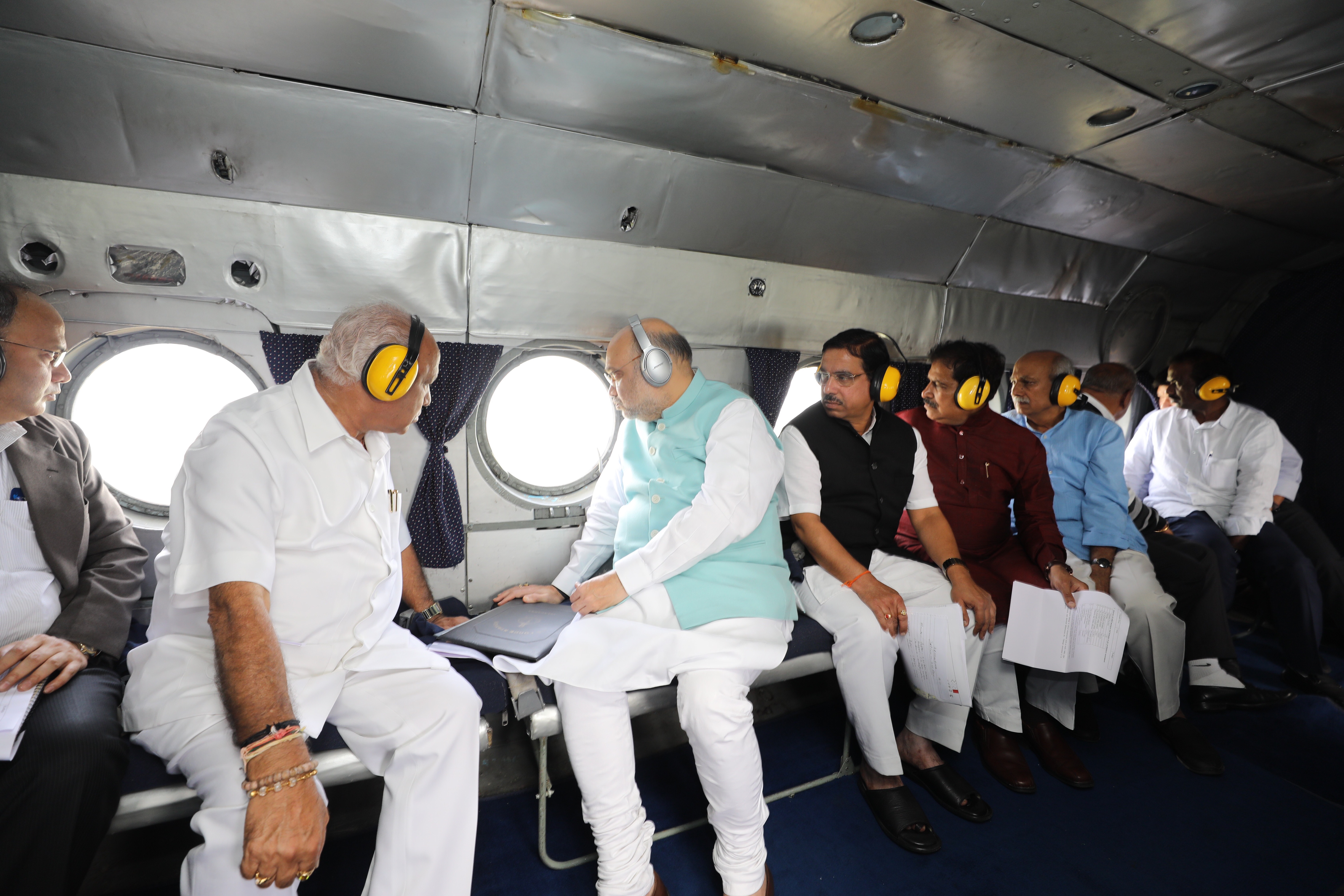 Photographs : Hon'ble Union Home Minister Shri Amit Shah undertakes aerial survey to review the food situation in Belagavi district, Karnataka and Sangli & Kolhapur districts of Maharashtra..