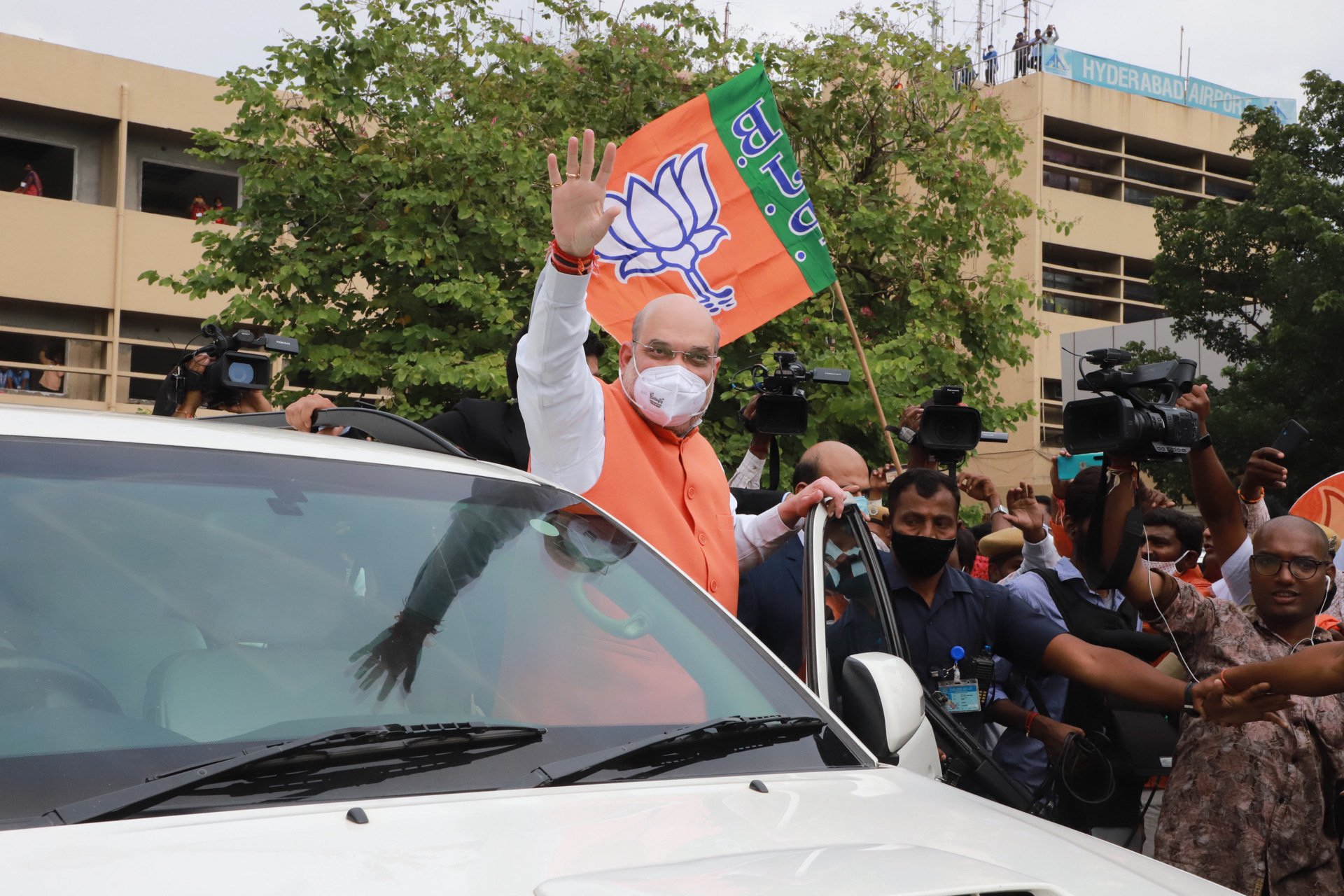 Photographs : Hon'ble Union Home Minister Shri Amit Shah ji's rousing reception on his arrival at Hyderabad Airport.