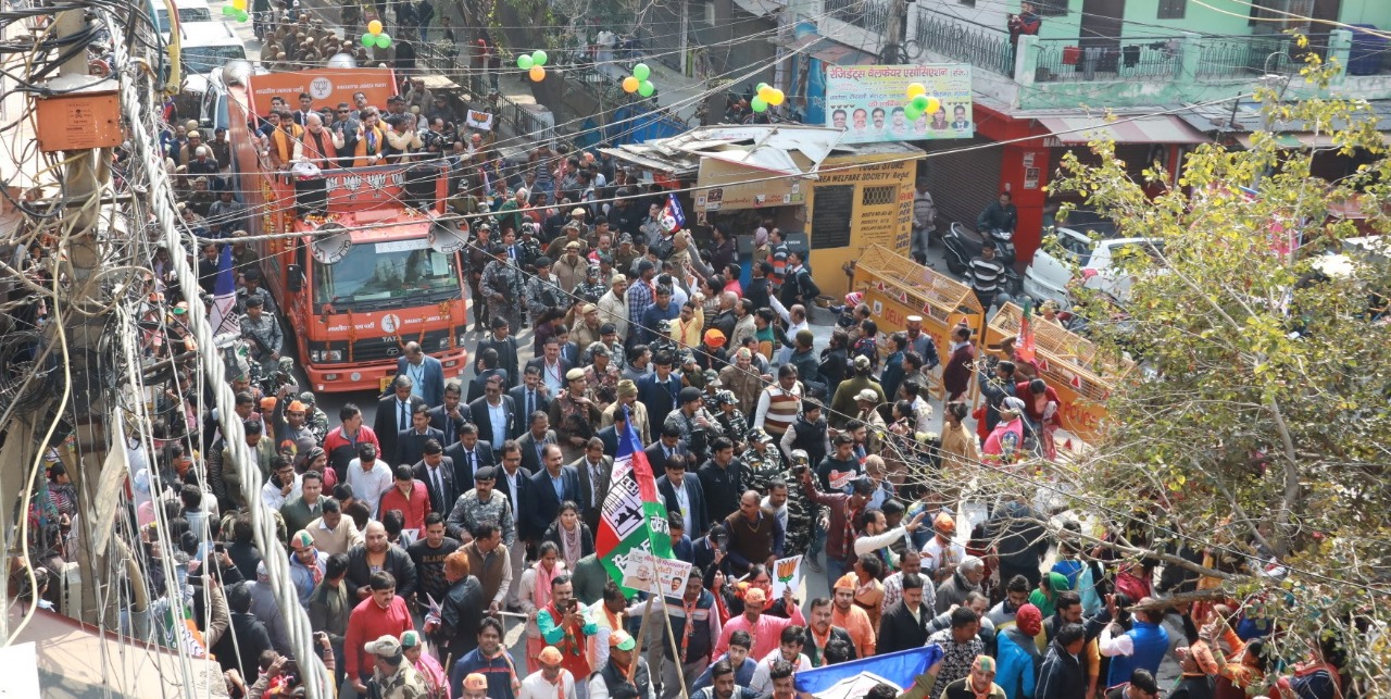 Photographs : Road show of Hon'ble Home Minister Shri AmitShah in Seemapuri Vidhansabha (Delhi) from Nand Nagri Tanga Stand to DilshadGarden