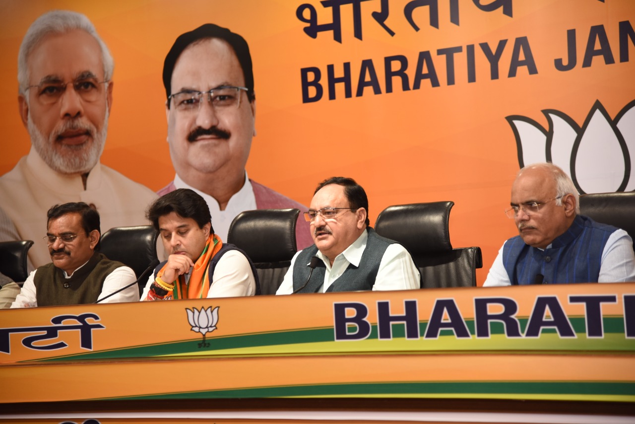 Photograps: BJP National President Shri JP Nadda inducts Shri Jyotiraditya Scindia into the party at the headquarters in New Delhi