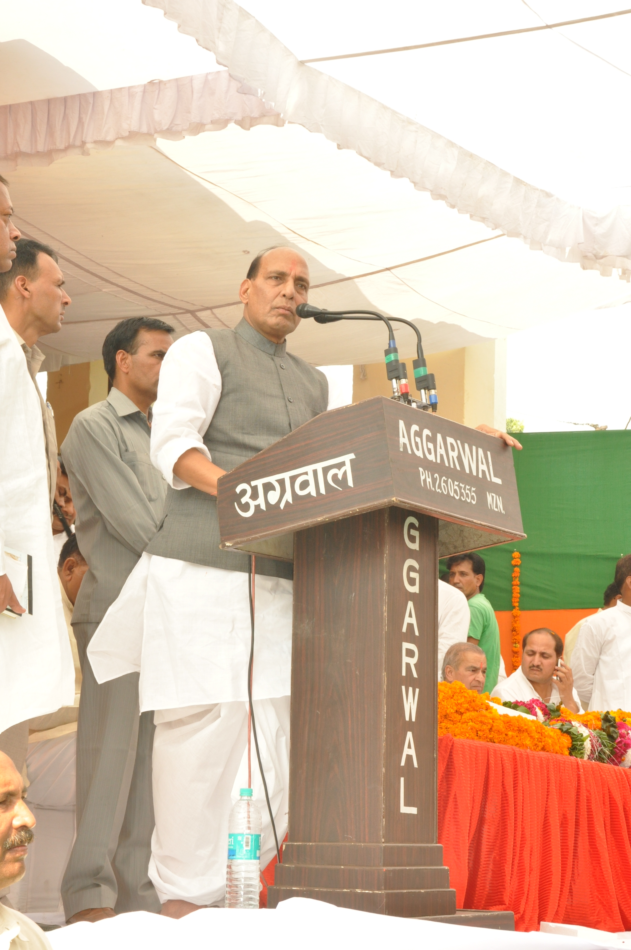 Former BJP President Shri Rajnath Singh addressing a press conference at Jan Swabhiman Yatra on October 17, 2011