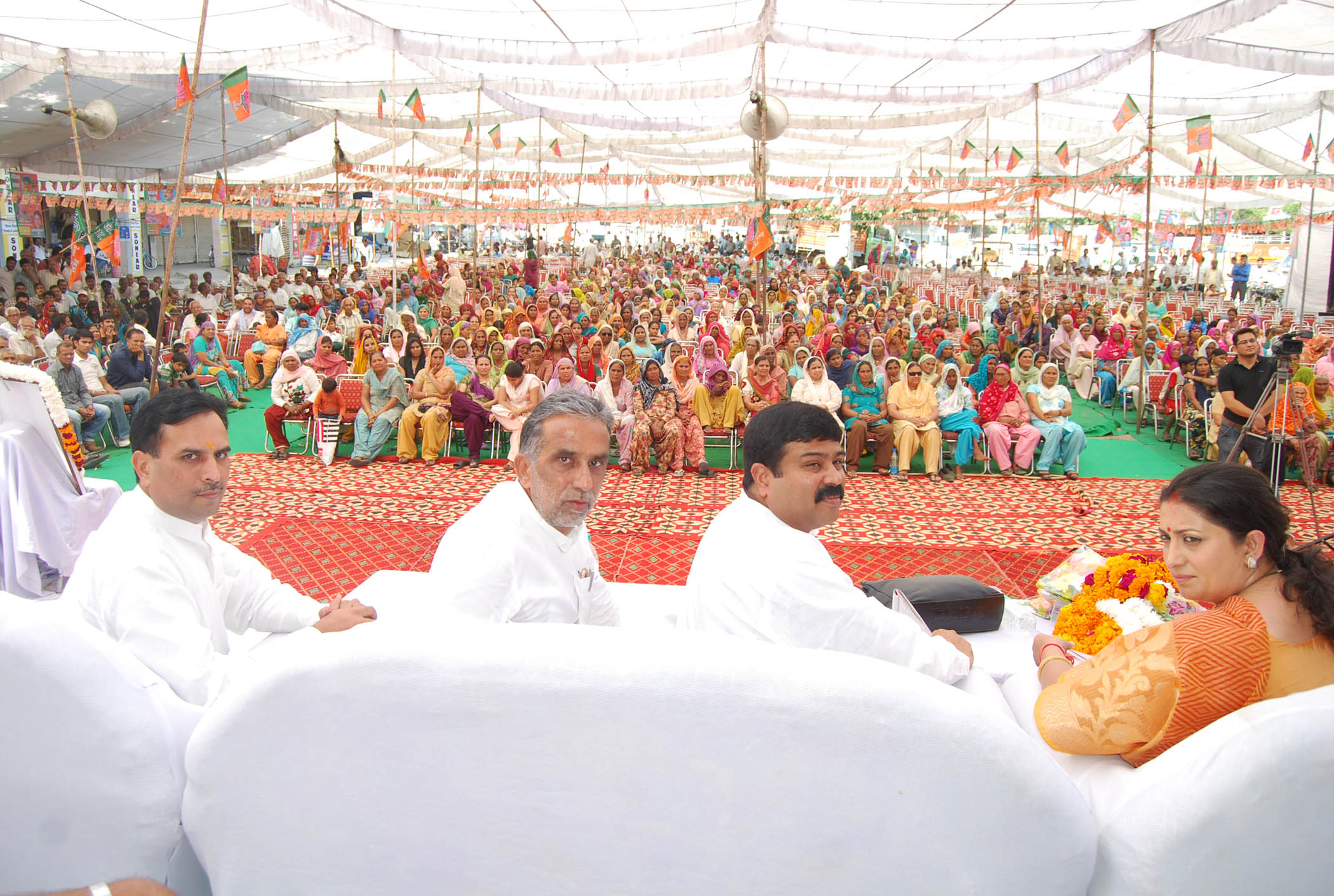 Shri Dharmender Pradhan and Smt Smriti Irani at Rohtak(Haryana) on October 12, 2012