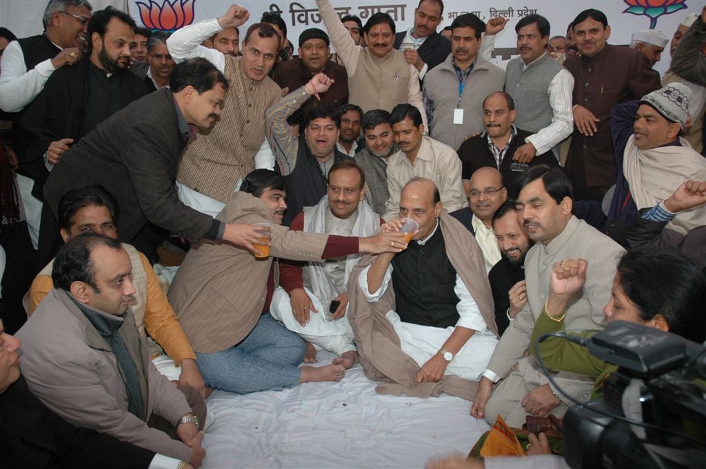 BJP President, Shri Nitin Gadkari facilitating the breaking of fast of Shri Rajnath Signhji at the Rajghat on January 26, 2011