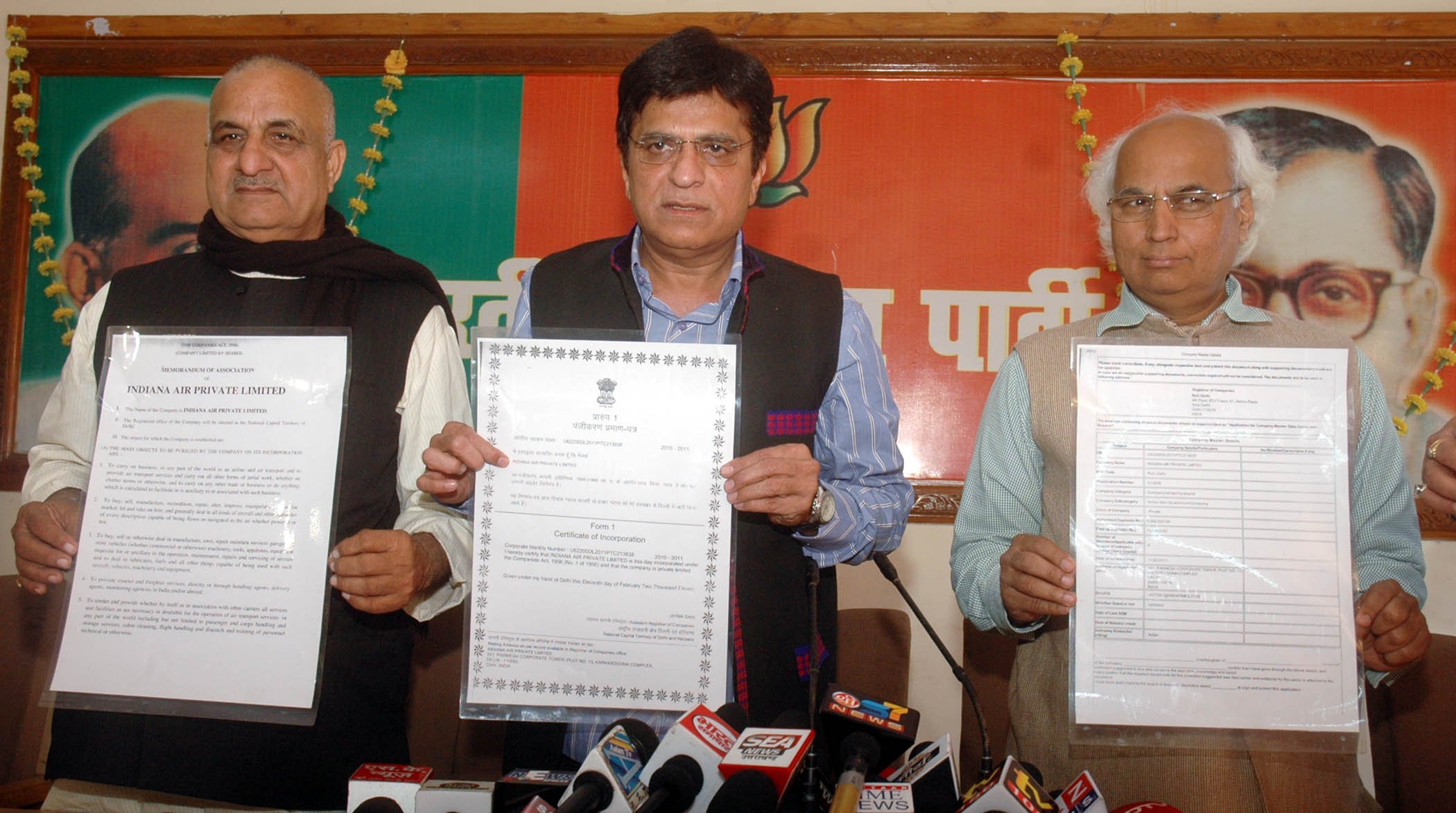 Shri Kirit Somaiya, BJP National Secretary exhibiting documentary proof in a press conference relating to registration of Mayawati''s brother fake air company at Lucknow on February 06, 2012