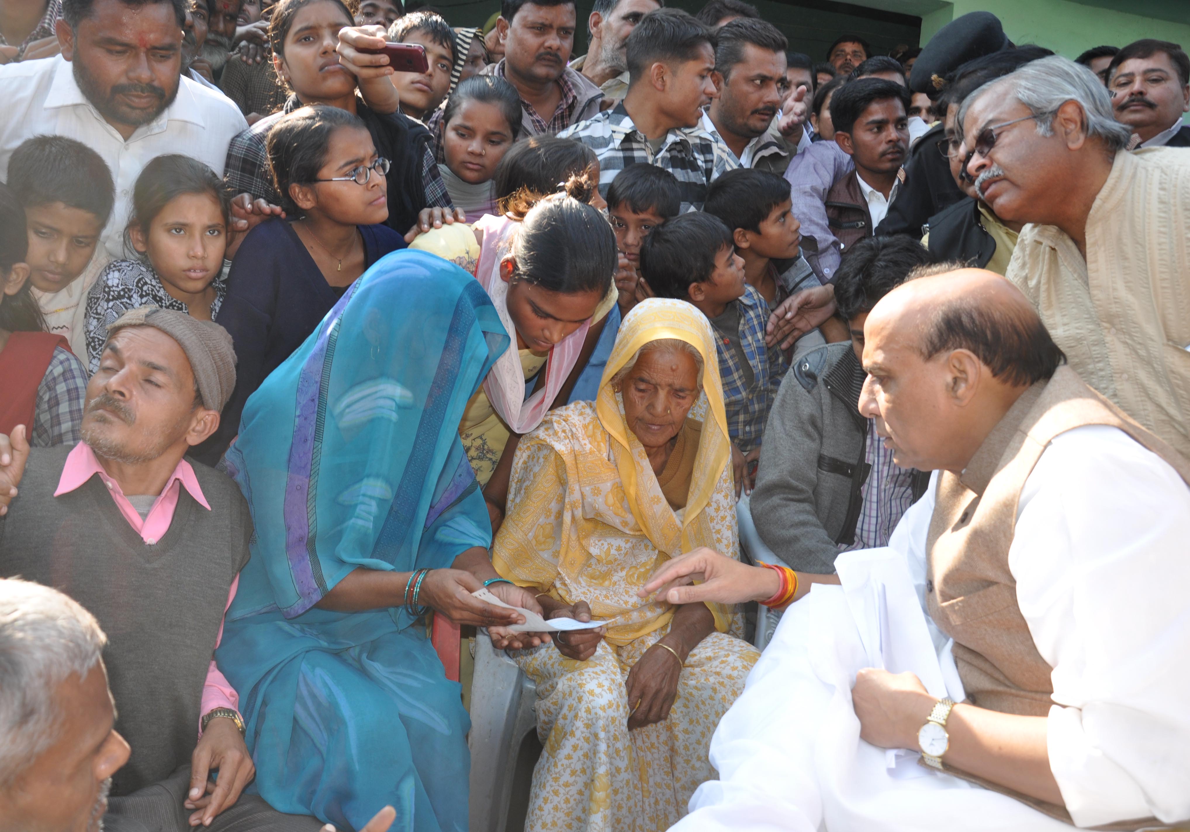 BJP NationalPresident, Shri Rajnath Singh and BJP National Secretary, Shri Amit Shah meeting with the family of cane farmer who committed suicide in Lakhimpur on December 3, 2013