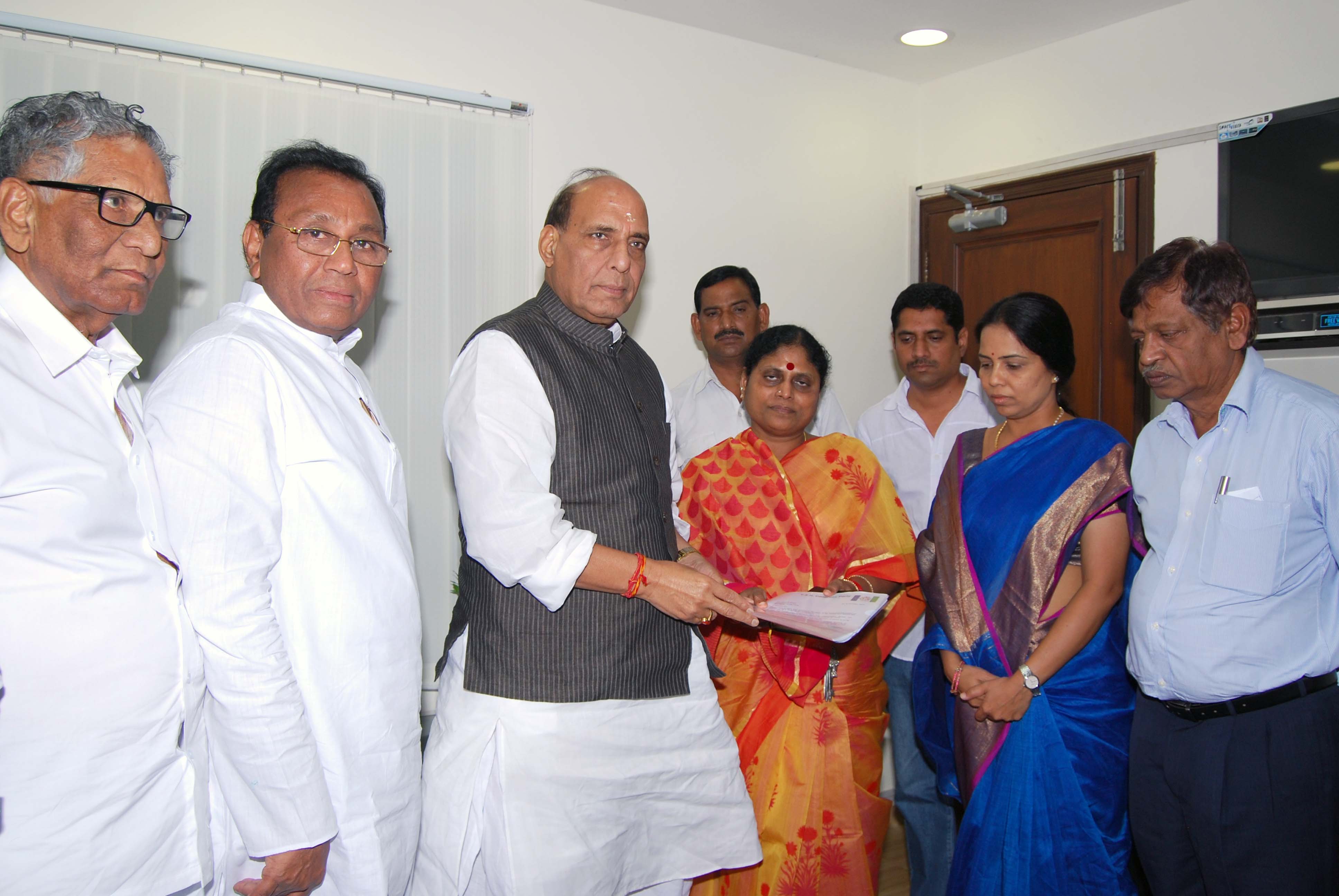 YSR Congress Party (YSRCP) President, Y.S Vijayamma with MPs and Leaders meeting with BJP President, Shri Rajnath Singh at his residence 38, Ashoka Road on October 9, 2013