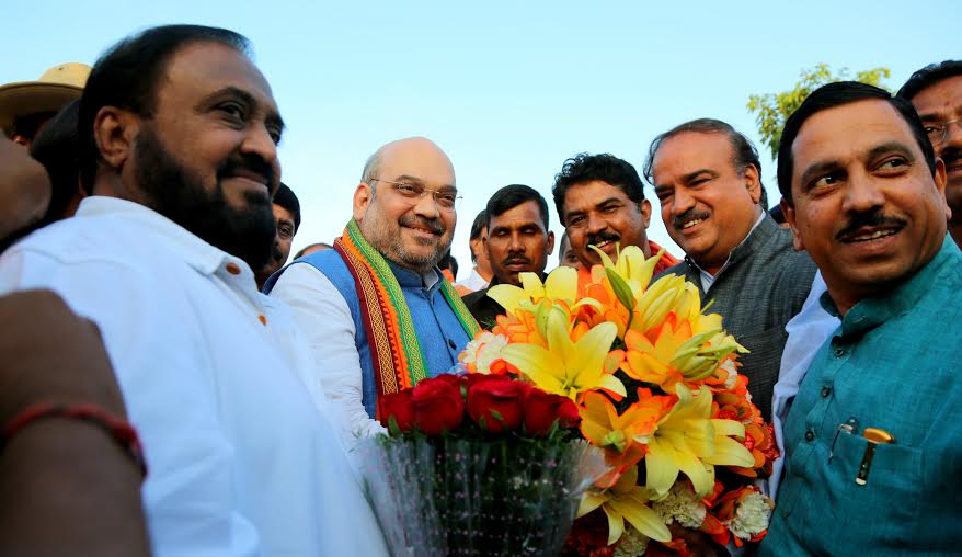 BJP National President, Shri Amit Shah congratulating Karyakartas & Party leaders at Bengaluru Airport on August 25, 2015