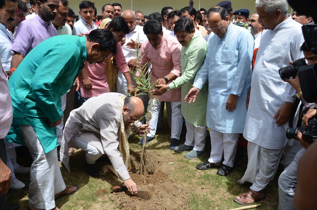 BJP National President, Shri Amit Shah doing plantation on the occasion of World Environment Day at 11, Ahsok Road on 5 June 2017