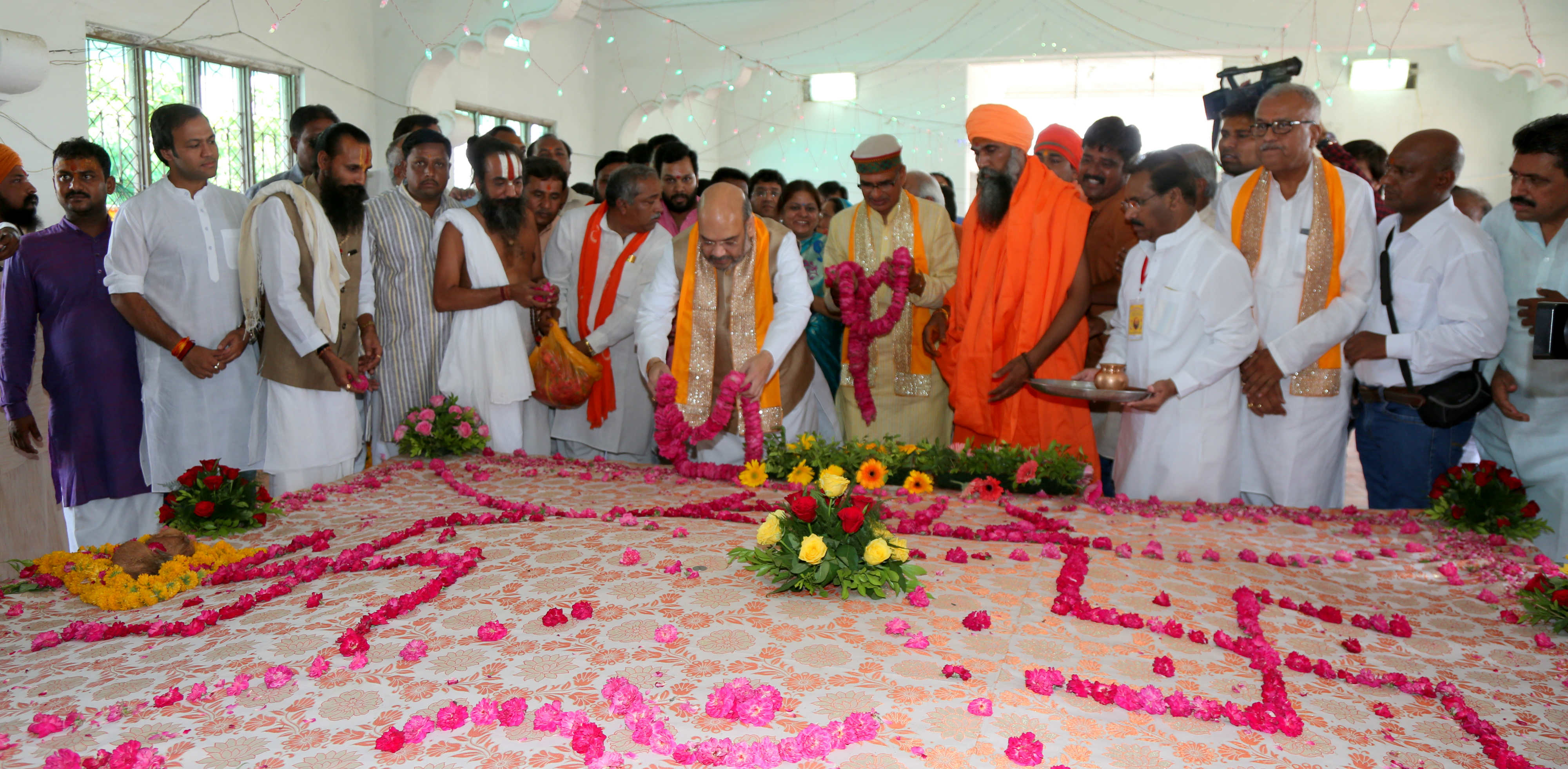 BJP National President, Shri Amit Shah having felicitated several saints & had lunch with them in Ujjain Simhastha Mahaparv on May 11, 2016