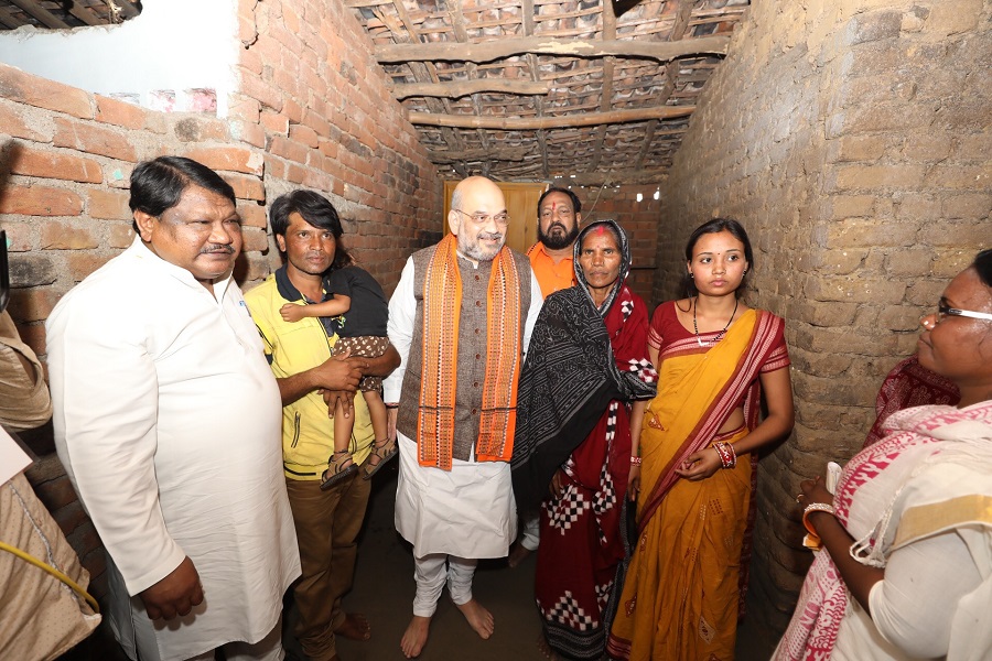 Photographs : BJP National President, Shri Amit Shah having lunch at dalit villager Shri Maheswar Suna ji's home in Deogaon village, Bolangir (Odisha)