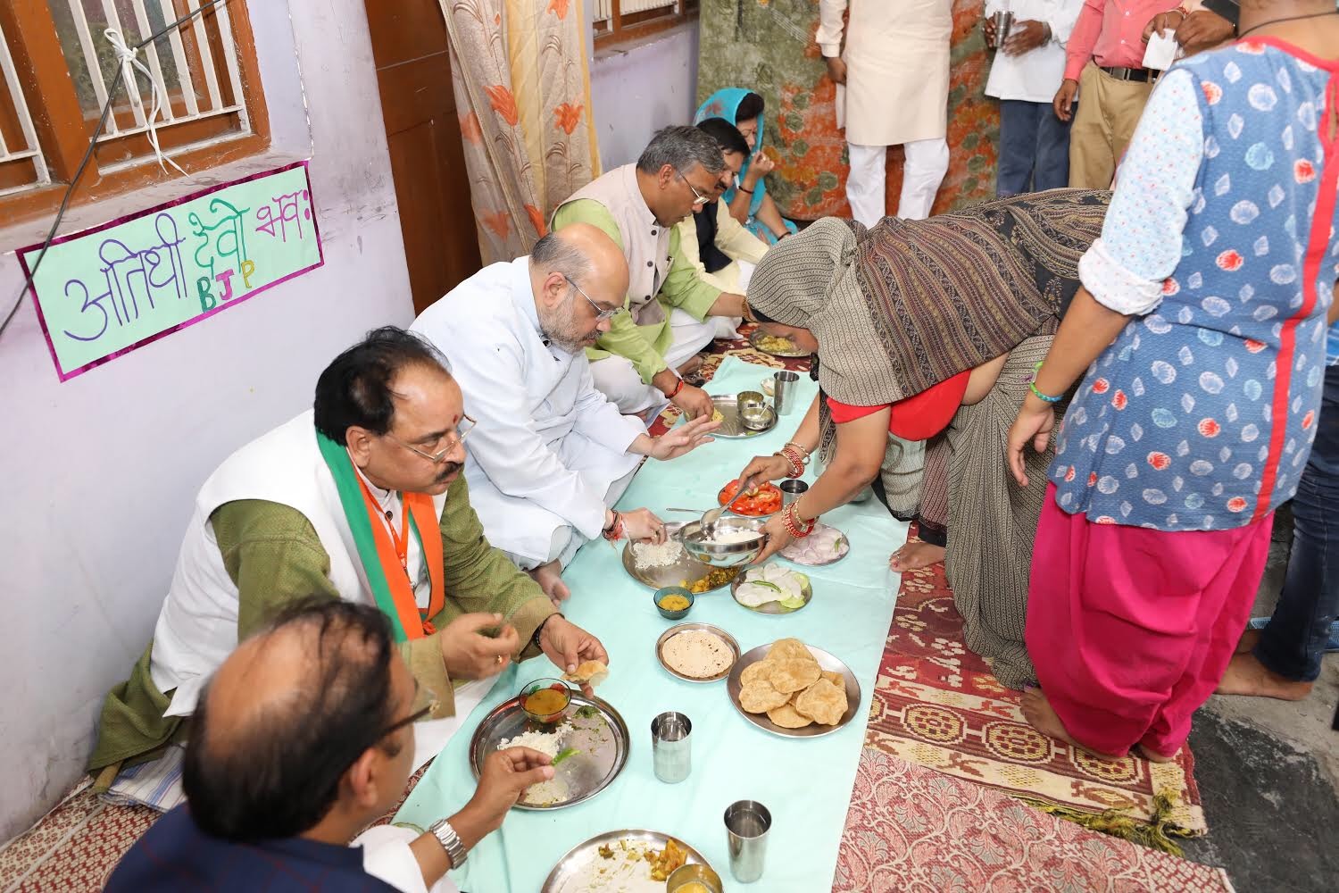 BJP National President, Shri Amit Shah having lunch at the residence of BJP karyakarta Shri Munne Singh in Dehradun (Uttarakhand)