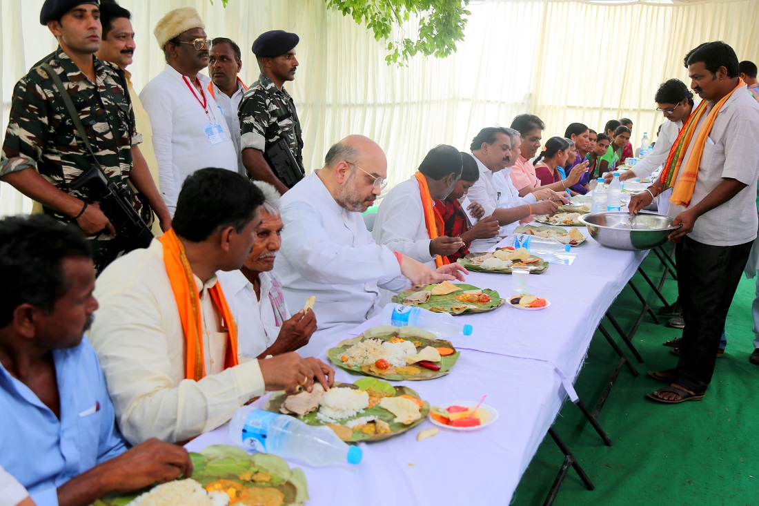 BJP National President, Shri Amit Shah having lunch in a Dalit Colony at Theratpally Village, Nalgonda Telangana on 22 mAy 2017