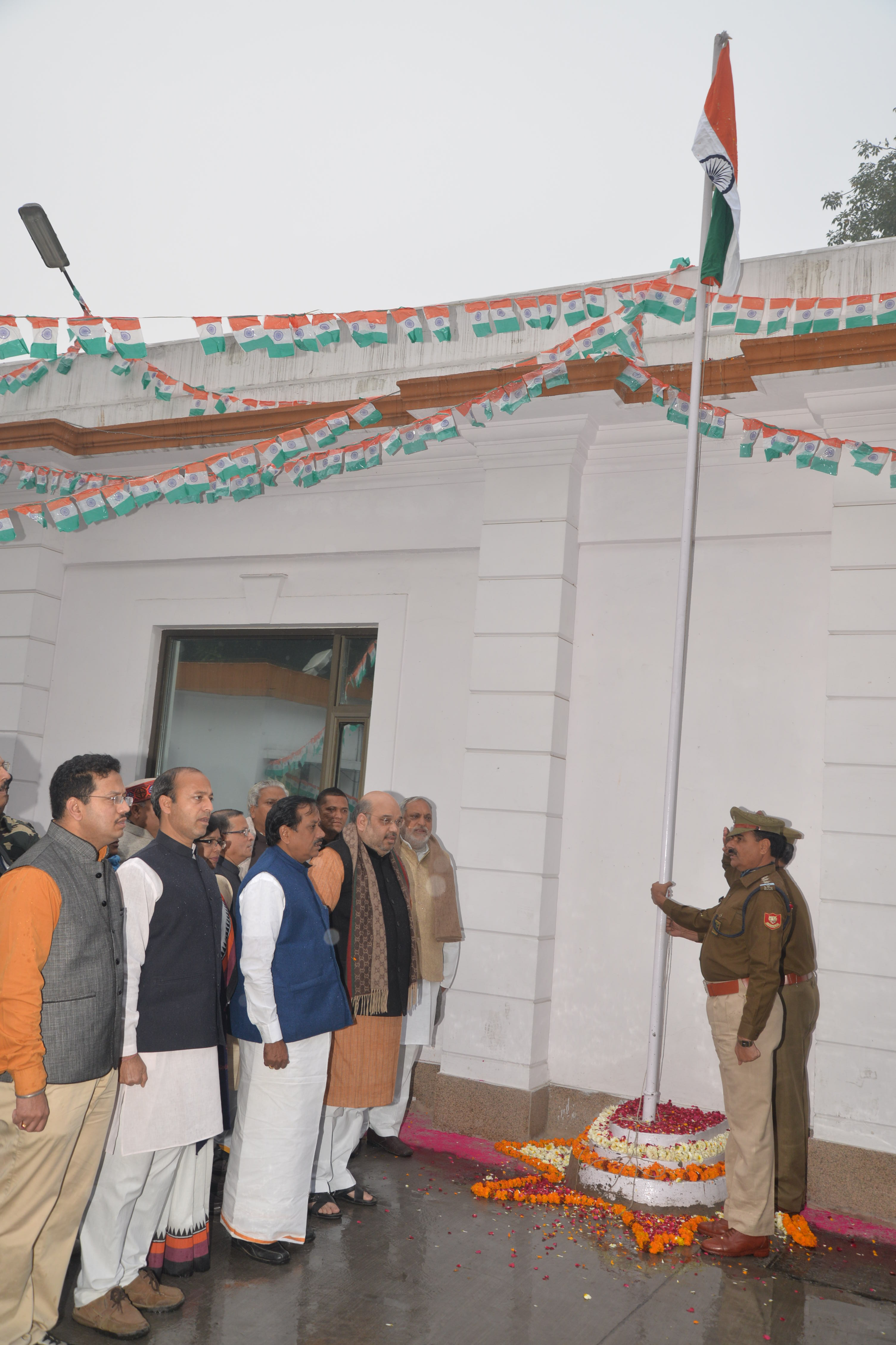 BJP National President, Shri Amit Shah hoisting the National Flag on the occasion of 66th Republic Day at 11, Ashoka Road on January 26, 2015