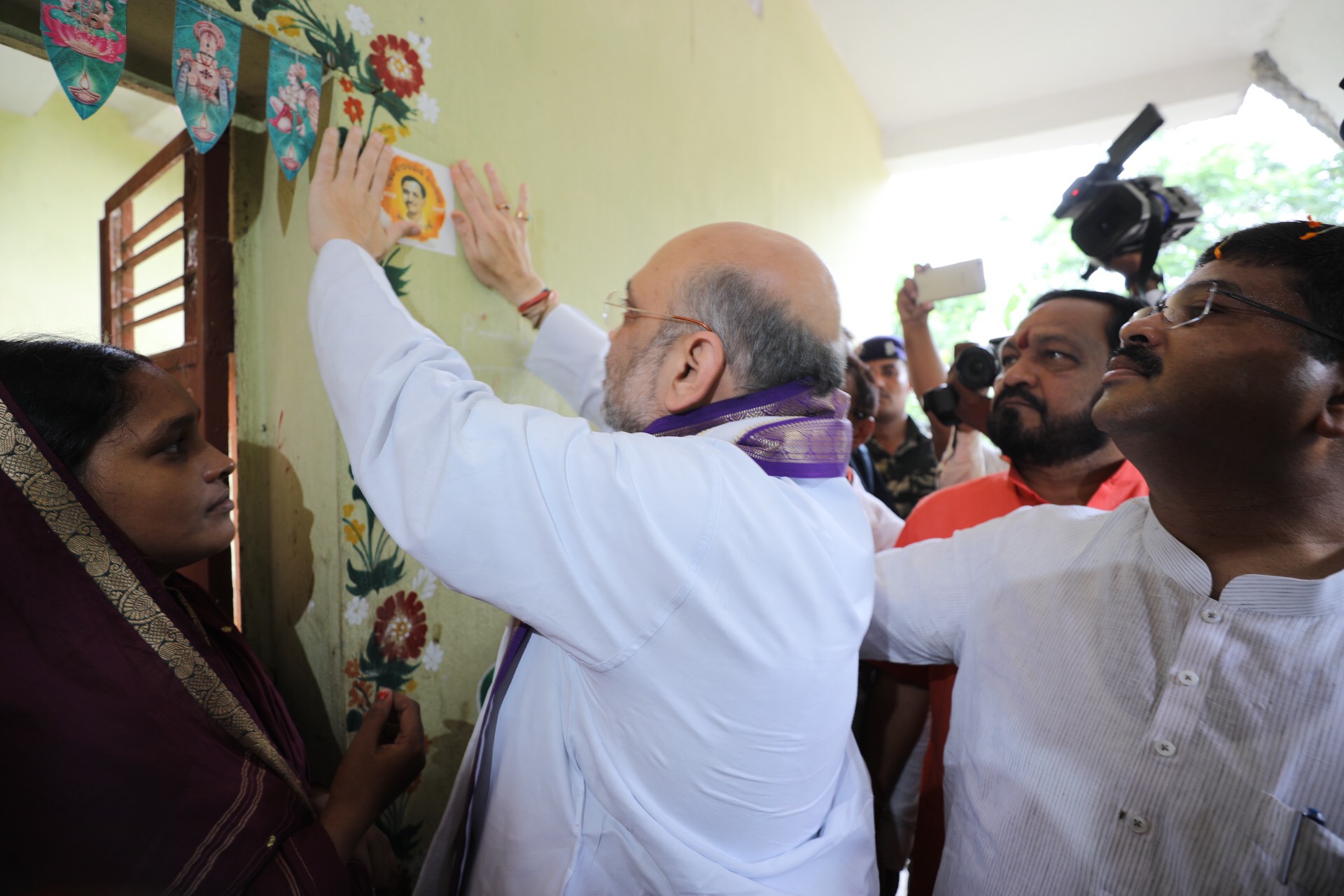 BJP National President, Shri Amit Shah ji's door to door sampark at booth no. 191 in Basantpur, Dhauli Odisha on 6 July 2017