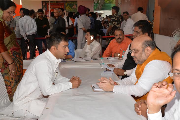 BJP National President, Shri Amit Shah meet party workers at 11, Ashoka Road, on April, 6, 2015