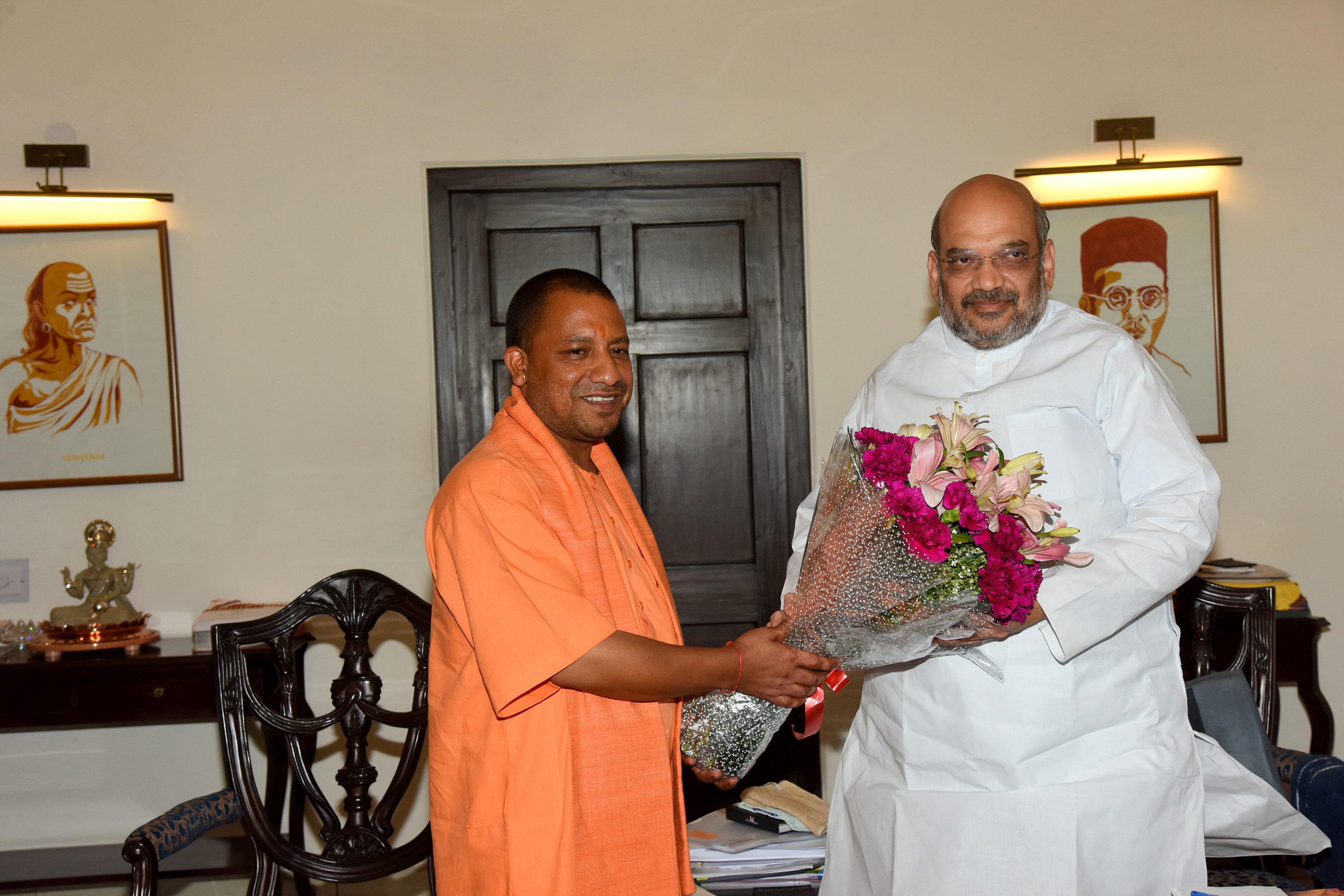 BJP National President, Shri Amit Shah meeting with Chief Minister of Uttar Pradesh, Shri Yogi Adityanath at his residence on March 21, 2017