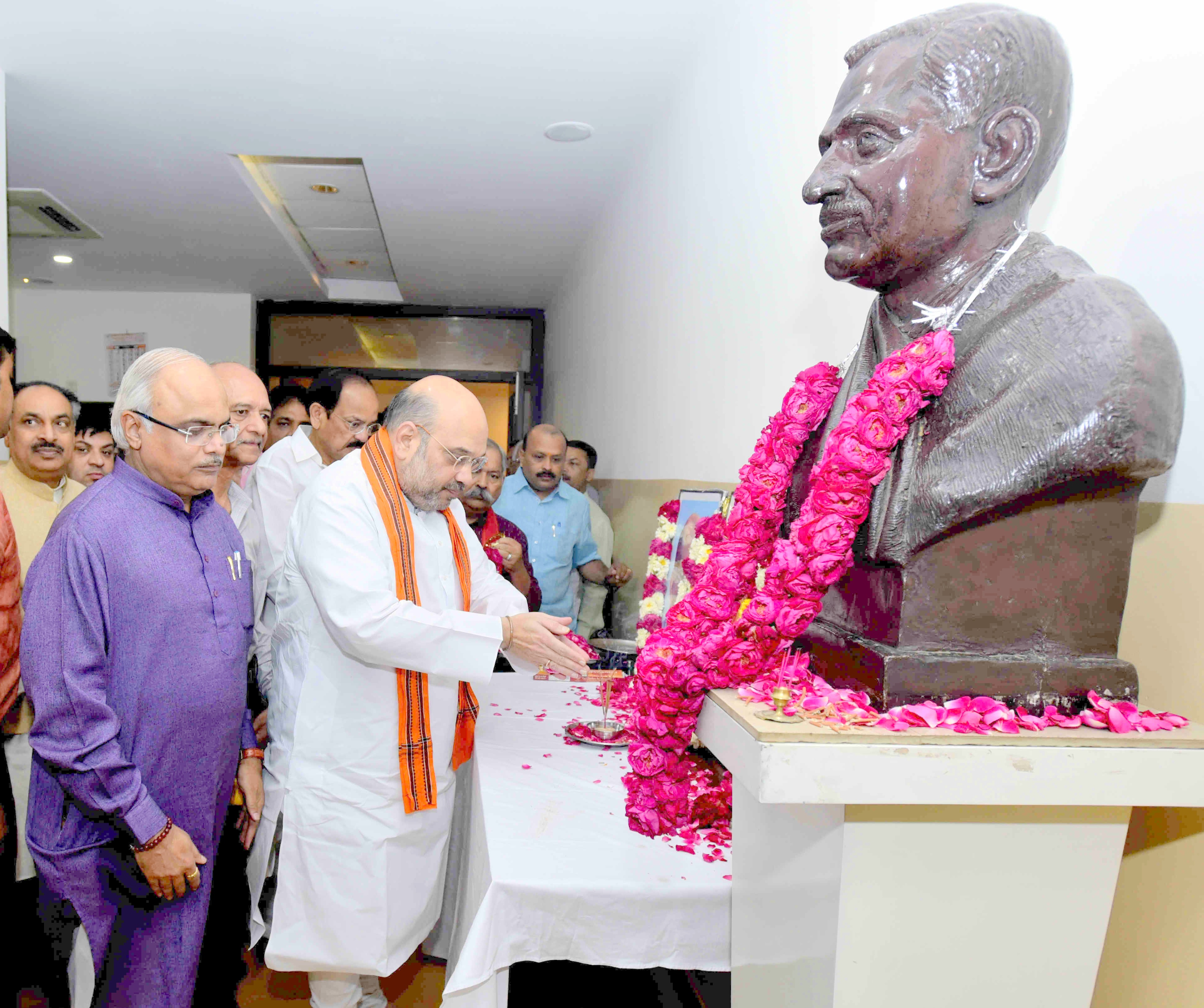 BJP National President, Shri Amit Shah paying floral tribute to Pandit Deendayal Upadhyayji on Foundation day of Bharatiya Janata Party at 11 Ashoka Road on April 06, 2016