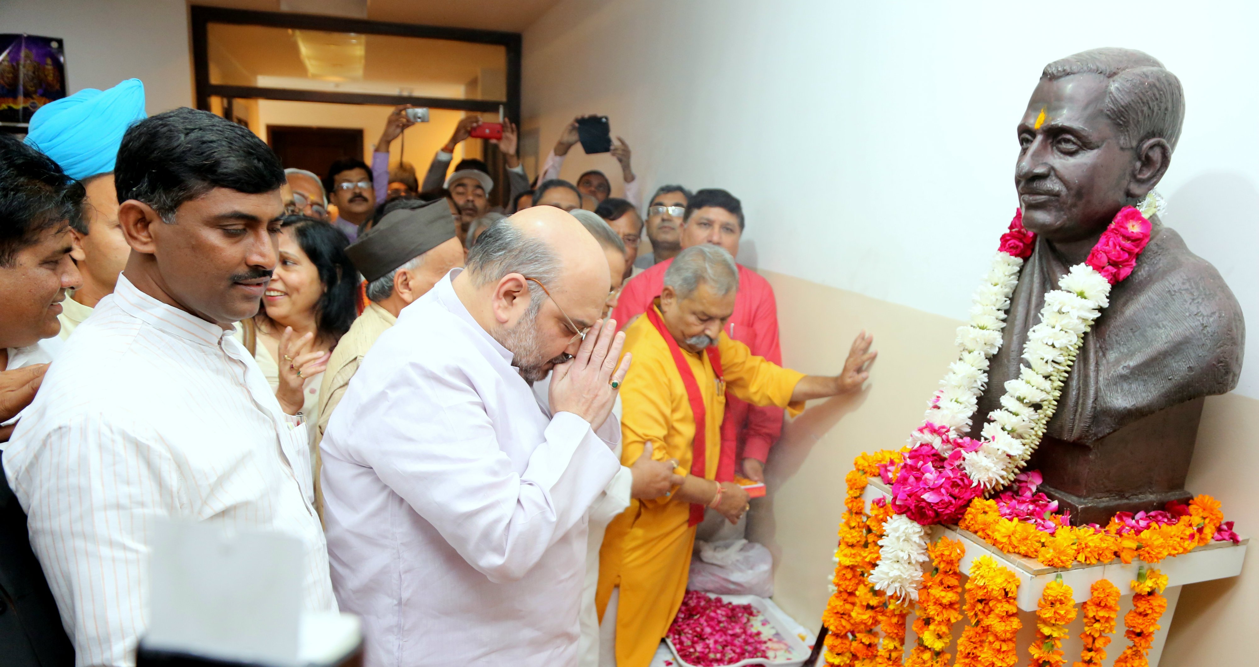 BJP National President Shri Amit Shah paying Floral Tribute to Pt. Deen Dayal Upadhaya on his Birth Anniversary at 11, Ashok Rd on September 25, 2015