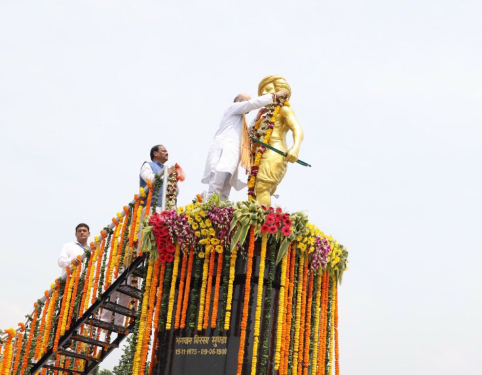 BJP National President, Shri Amit Shah paying floral tributes to the Bhagwan Birsa Munda's statute at his Birth place, Ulihatu in Jharkhand