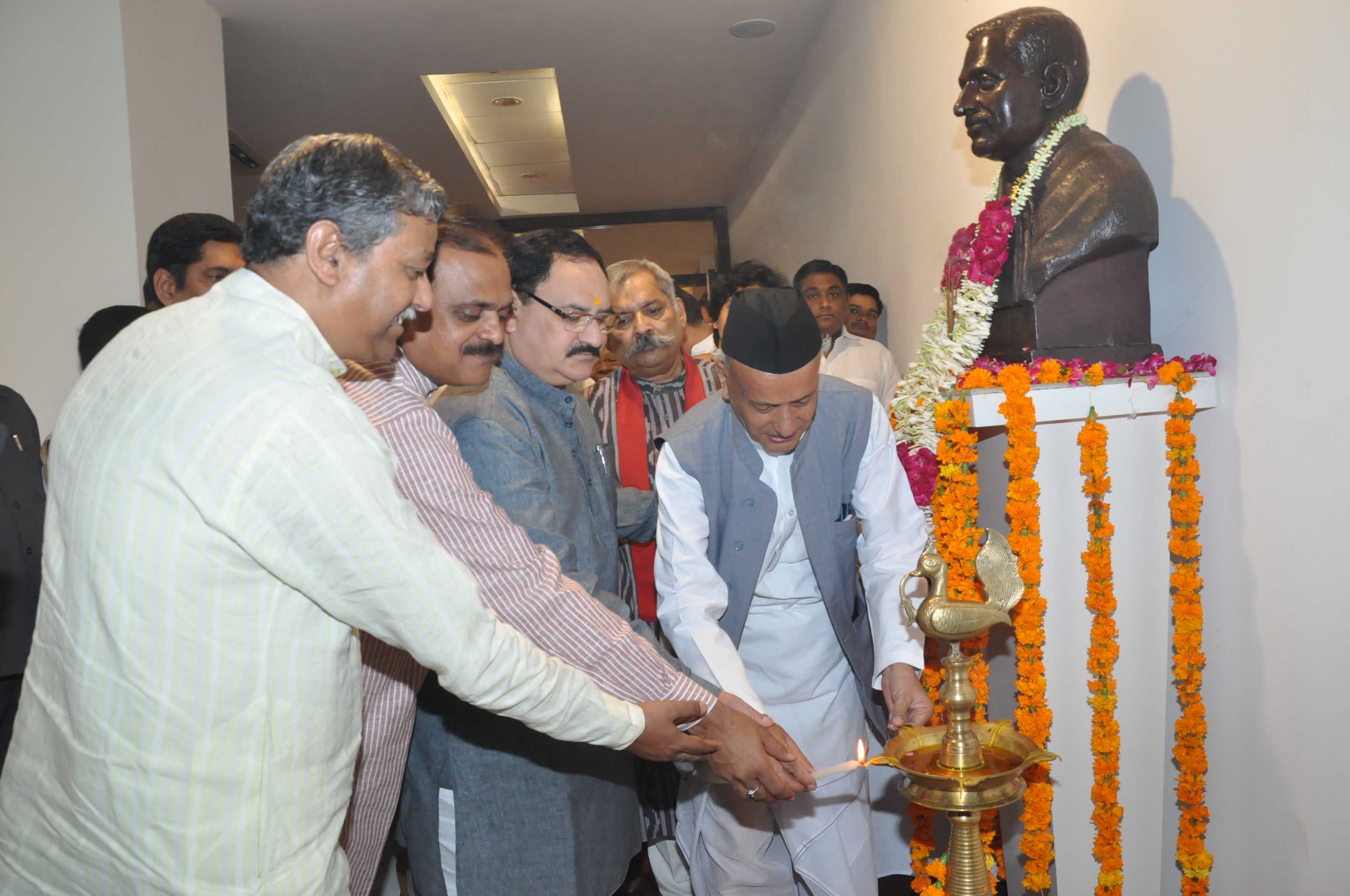 BJP senior leaders paying floral tribute to Pt. Deendayal Upadhyaya at 11, Ashoka Road, New Delhi on September 25, 2013