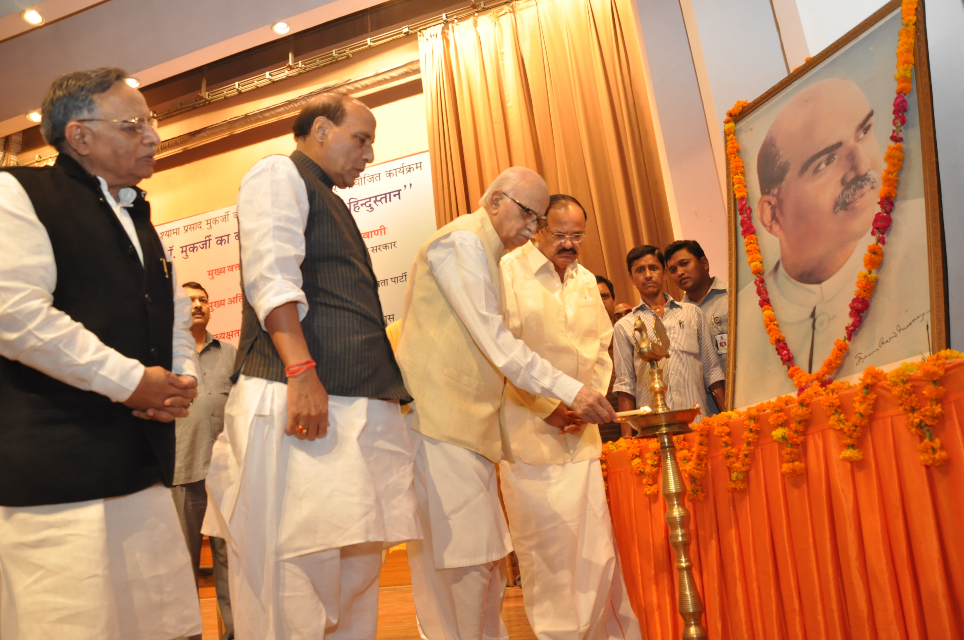 Shri L.K. Advani, Shri Rajnath Singh and Shri M. Venkaiah Naidu during Dr. Mukherji's 61st Balidan Diwas "Dr Mukherjee Ka Balidan, Yaad Rakhega Hindustan" at Sri Satya Sai Auditorium, Lodhi Road, New Delhi on June 21, 2013