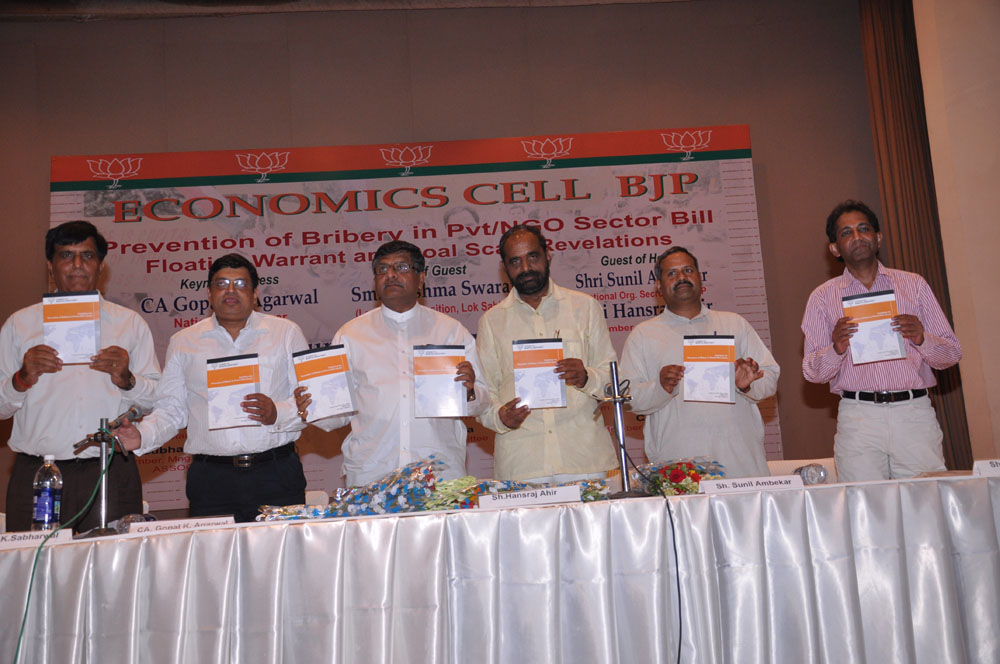 Shri Ravi Shankar Prasad and BJP Economic Cell members at a press conference on July 7, 2012