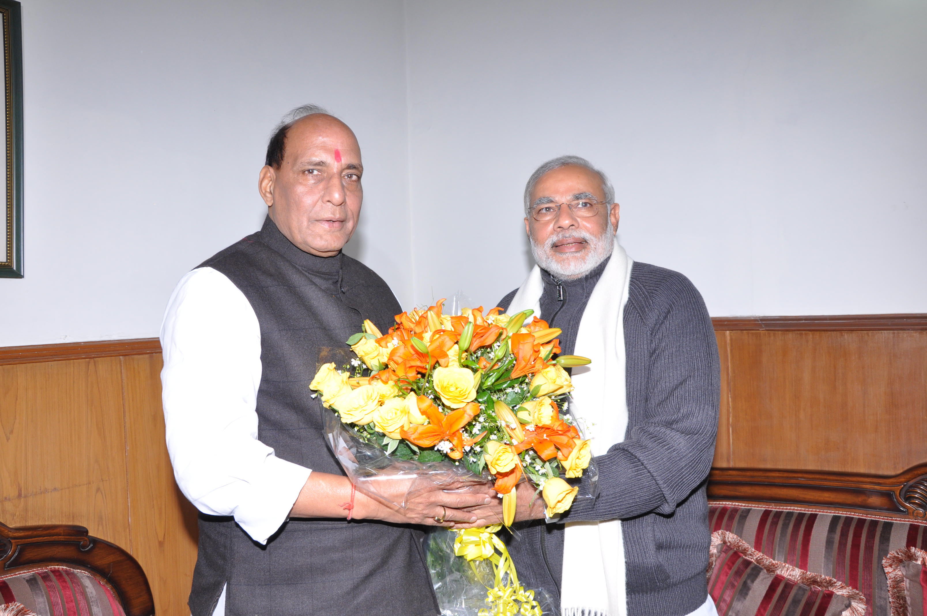 BJP National President, Shri Rajnath Singh congratulated by Gujarat Chief Minister, Shri Narendra Modi at 38, Ashoka Road on January 27, 2013