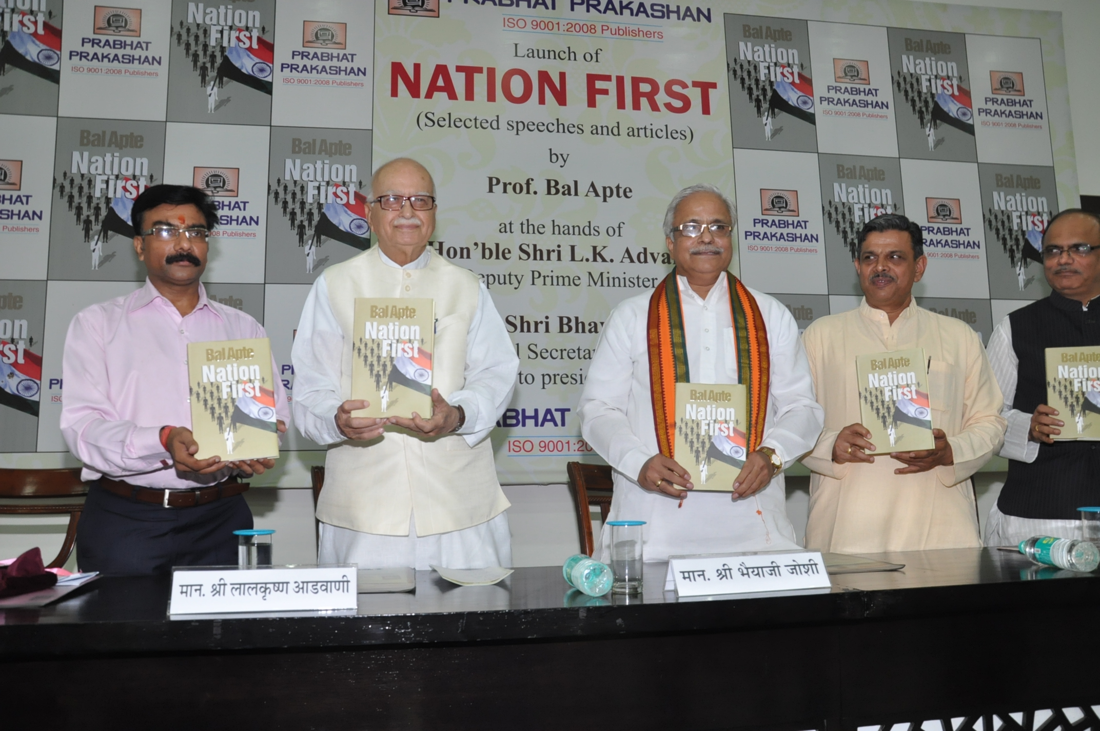 Shri L.K. Advaniji and Shri Bhaiyaji Joshi, Shri Dattatreya Hosabale and Dr. Vinay Sahasrabuddhe releasing Bal Apte's Book NATION FIRST at Speaker Hall, Constitution Club, Rafi Marg, New Delhi on September 30, 2013