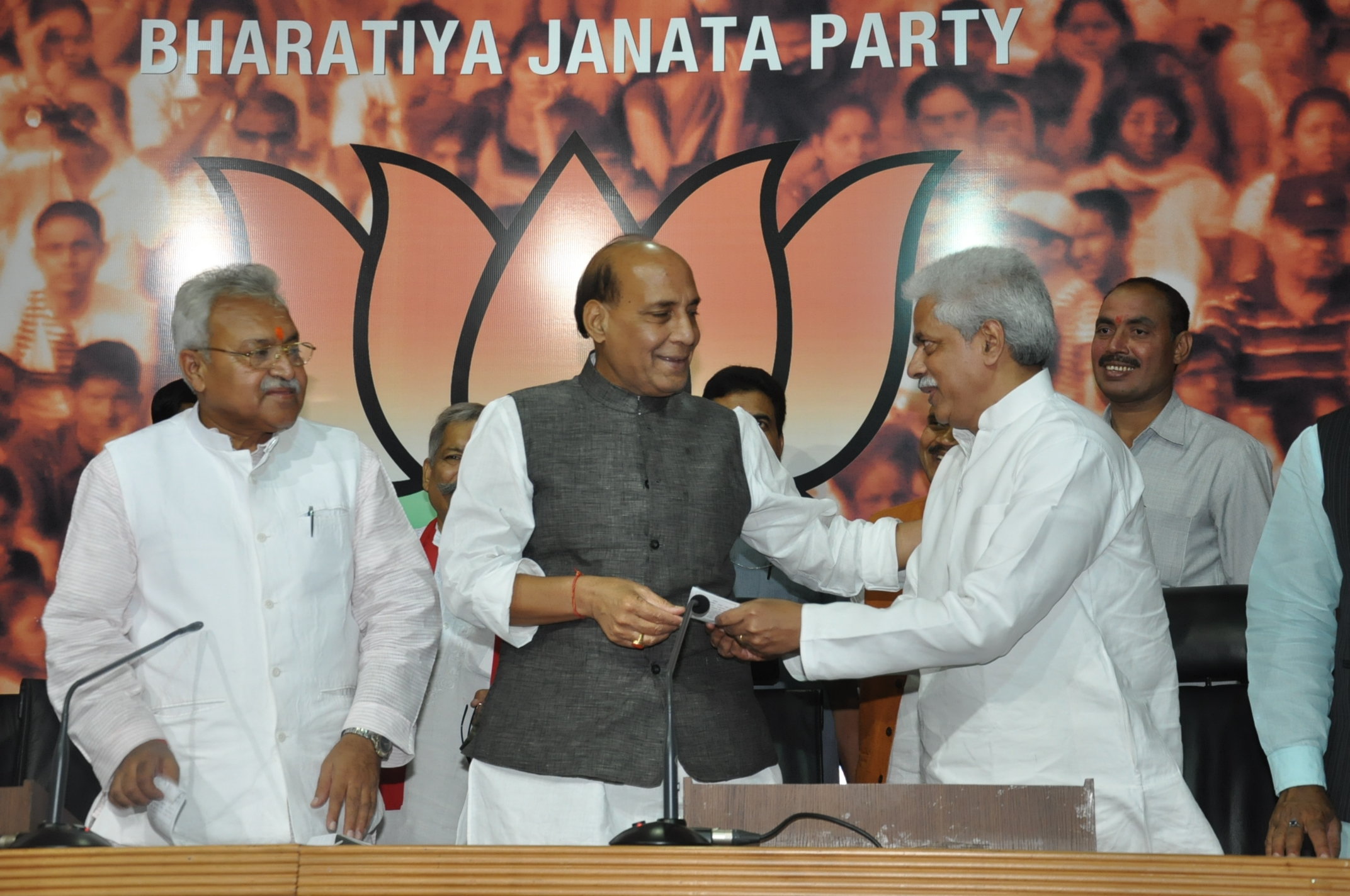 BJP National President, Shri Rajnath Singh greeting Shri Pankaj Singh (Son of Former PM, Shri Chandra Shekhar) after joining BJP on October 5, 2013