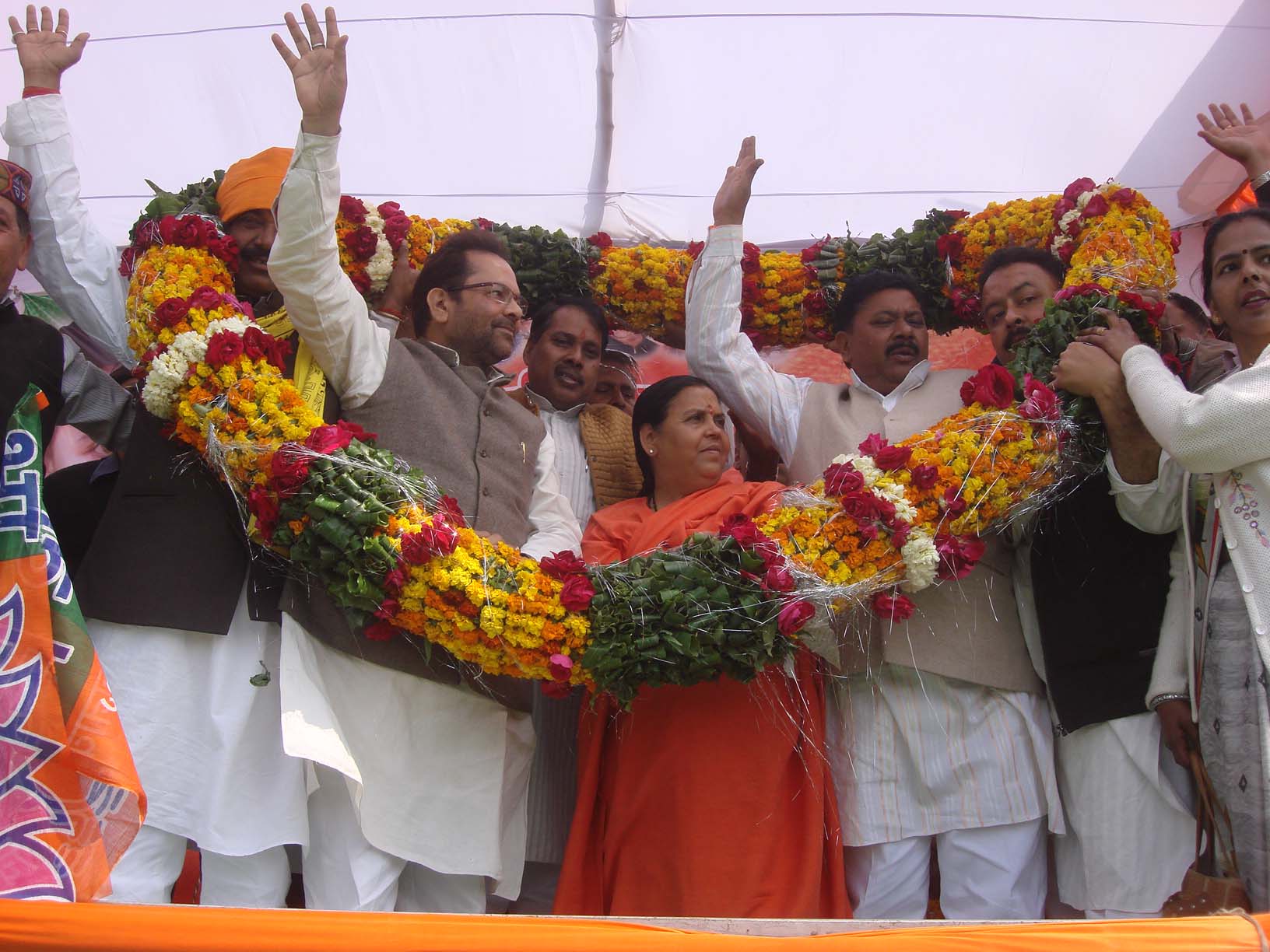 Shri Mukhtar Abbas Naqvi, National Vice-President and Sushree Uma Bharati, Former Chief Minister Madhya Pradesh addressing public meeting at Rampur Nagar Constituency on February 28, 2012