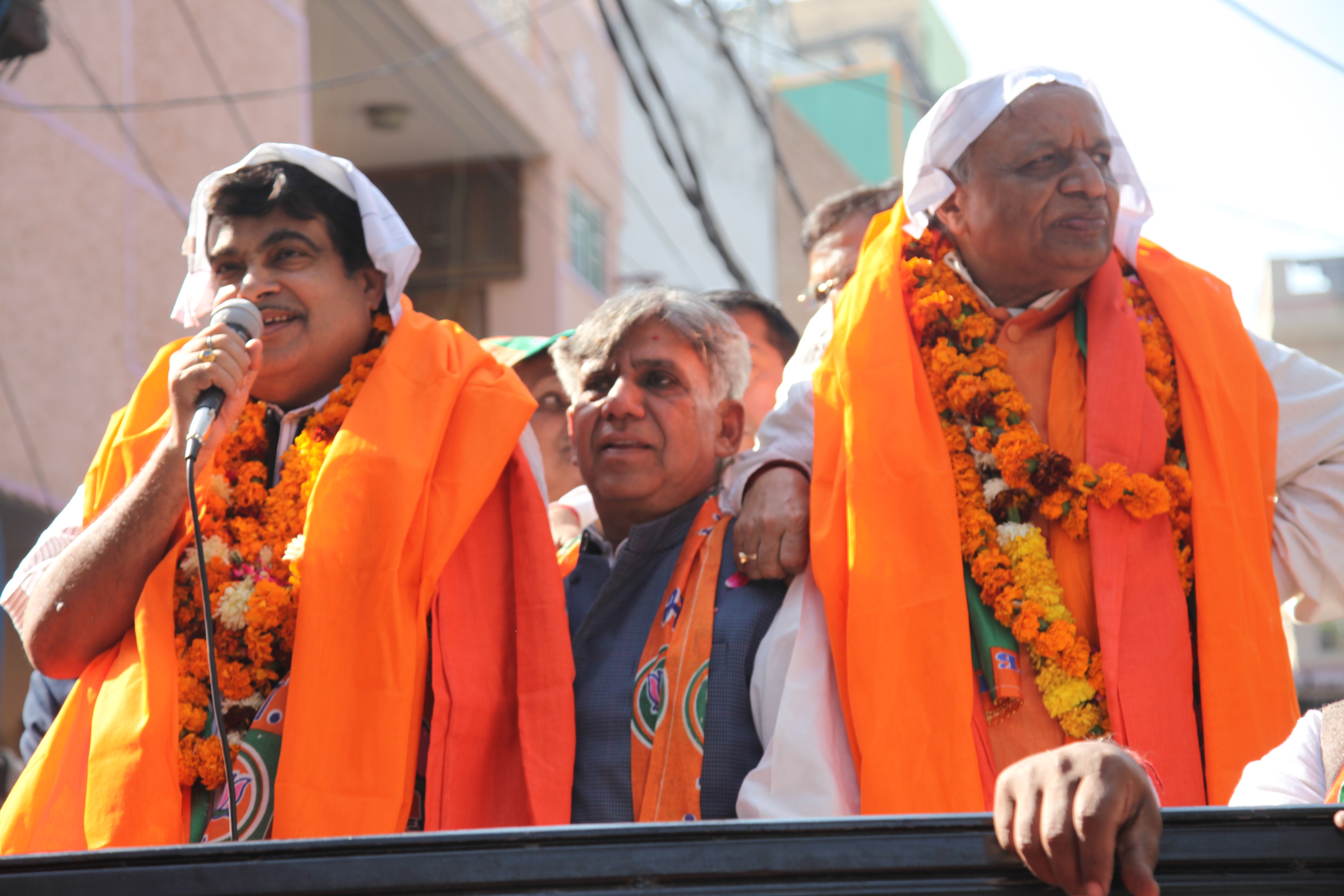 photographs of Shri Nitin Gadkari during Road Show at Trinagar Constituency for BJP Candidate Shri Nandkishore Garg in Delhi Election Campaign on December 01, 2013