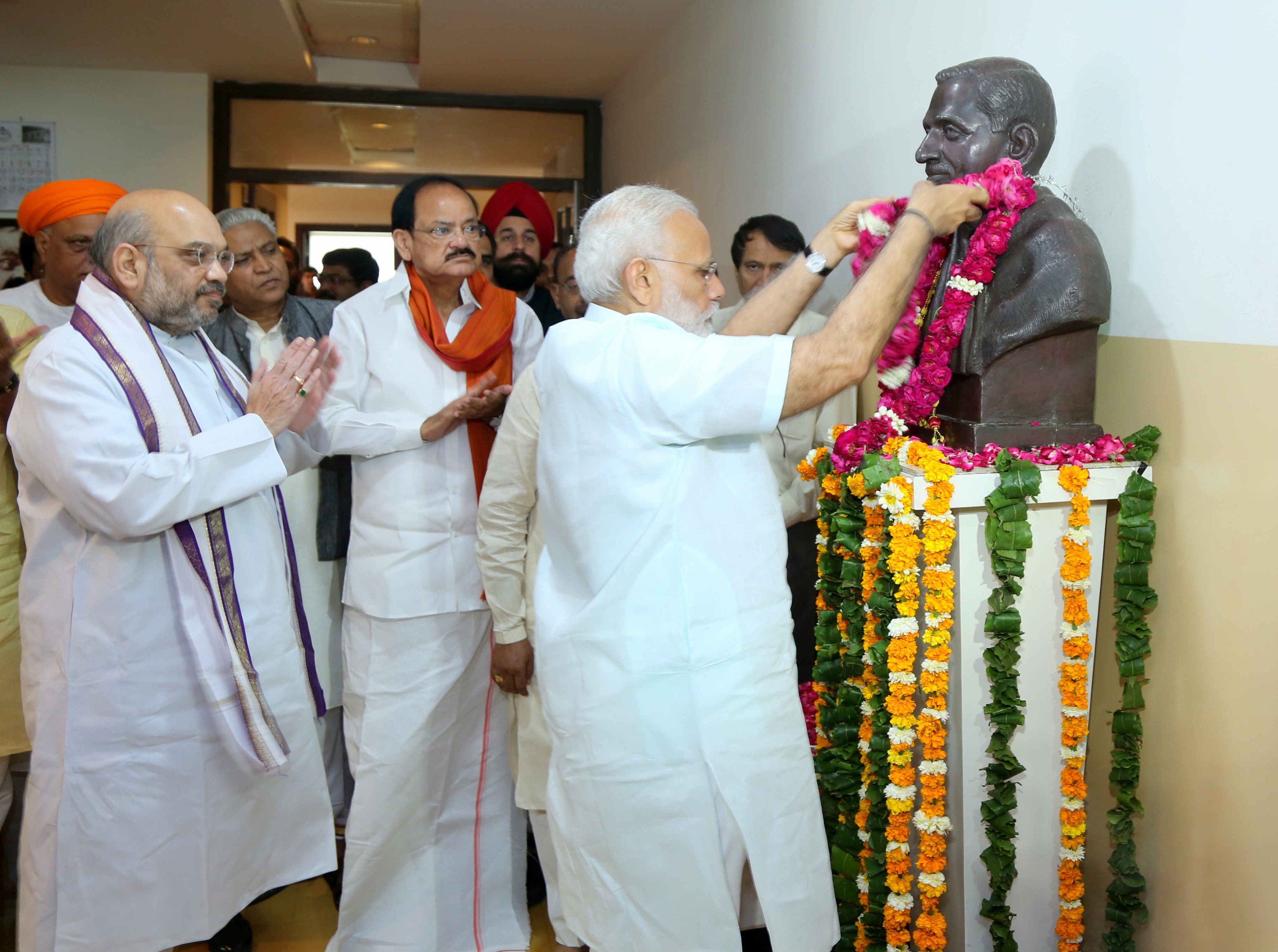 Hon'ble Prime Minister, Shri Narendra Modi and BJP National President, Shri Amit Shah along with other senior BJP Leaders paid floral tribute to Pandit Deen Dayal Upadhyay on BJP Foundation day at BJP HQ. at 11, Ashoka Road on April 06, 2017